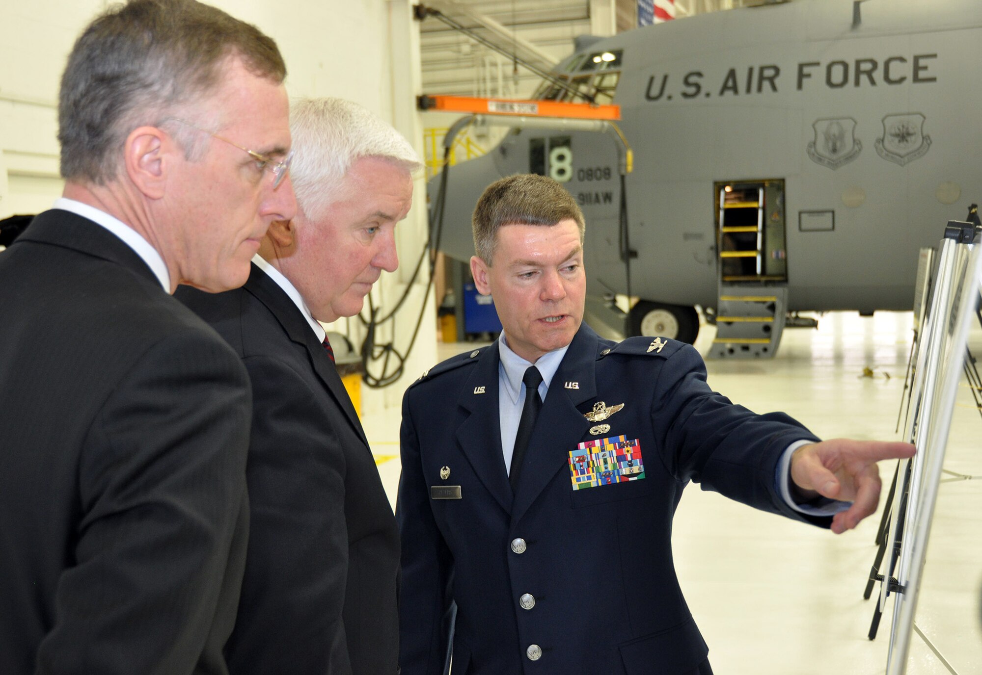 Rep. Tim Murphy (R-18) and Pennsylvania State Governor Tom Corbett receive a Wing mission brief from Col. Craig C. Peters, 911th Airlift Wing commander, Dec. 28, 2012.  During the visit the governor also received a tour of the C-130 cargo aircraft assigned to the wing as well as a hangar tour. At the conclusion of the mission brief, the governor held a press event which included numerous federal and state elected officials. Gov. Corbett began the press conference acknowledging the recent loss of military advocate and Pittsburgh Airport Chamber of Commerce president, Ms. Sally Haas and asked everyone to pause for a brief moment of silence in remembrance of her and her contributions. (U.S. Air Force photo by Senior Airman Joseph E. Bridge/Released)