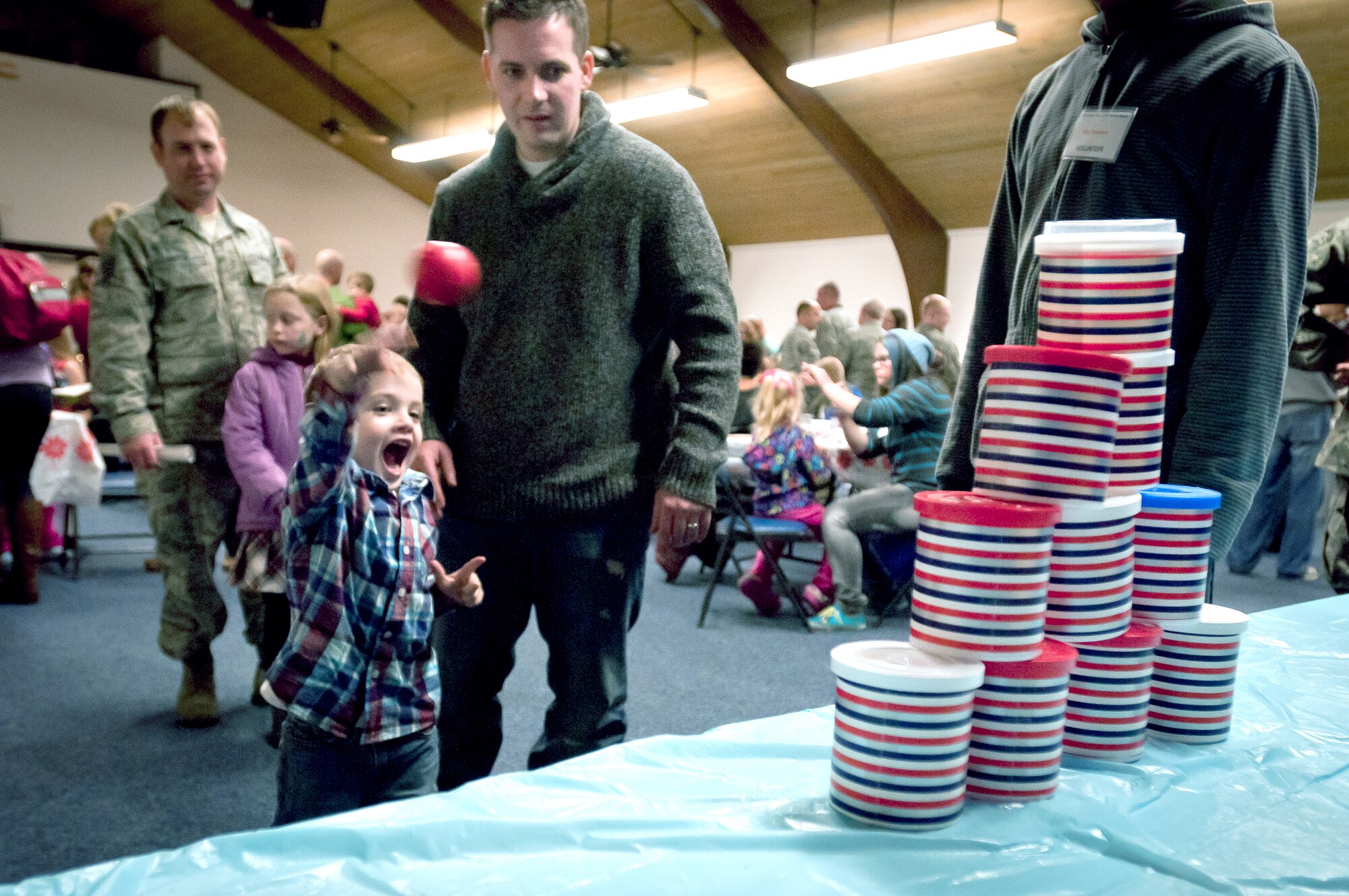 The son of Staff Sgt. James Edington, a crew chief in the 123rd Aircraft Maintenance Squadron, plays a game during the 123rd Airlift Wing’s family holiday party at the Kentucky Air National Guard Base in Louisville, Ky., Dec. 2, 2012. The annual event also offered snacks and prizes for the more than 85 children who participated. (Kentucky Air National Guard photo by Staff Sgt. Maxwell Rechel)