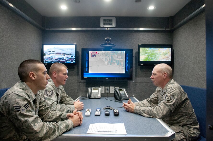 Senior Airman Eric Finley, Technical Sgt. Josh Thompson and Staff Sgt. Tim Cummins, all emergency managers for the Kentucky Air National Guard’s 123rd Civil Engineer Squadron, train on the video conferencing capabilities of a new Mobile Emergency Operations Center in Louisville, Ky., on Dec. 1, 2012. The $750,000 MEOC will enhance the unit’s ability to support civilian emergency responders following a catastrophe in the United States. (U.S. Air Force photo by Staff Sgt. Maxwell Rechel)