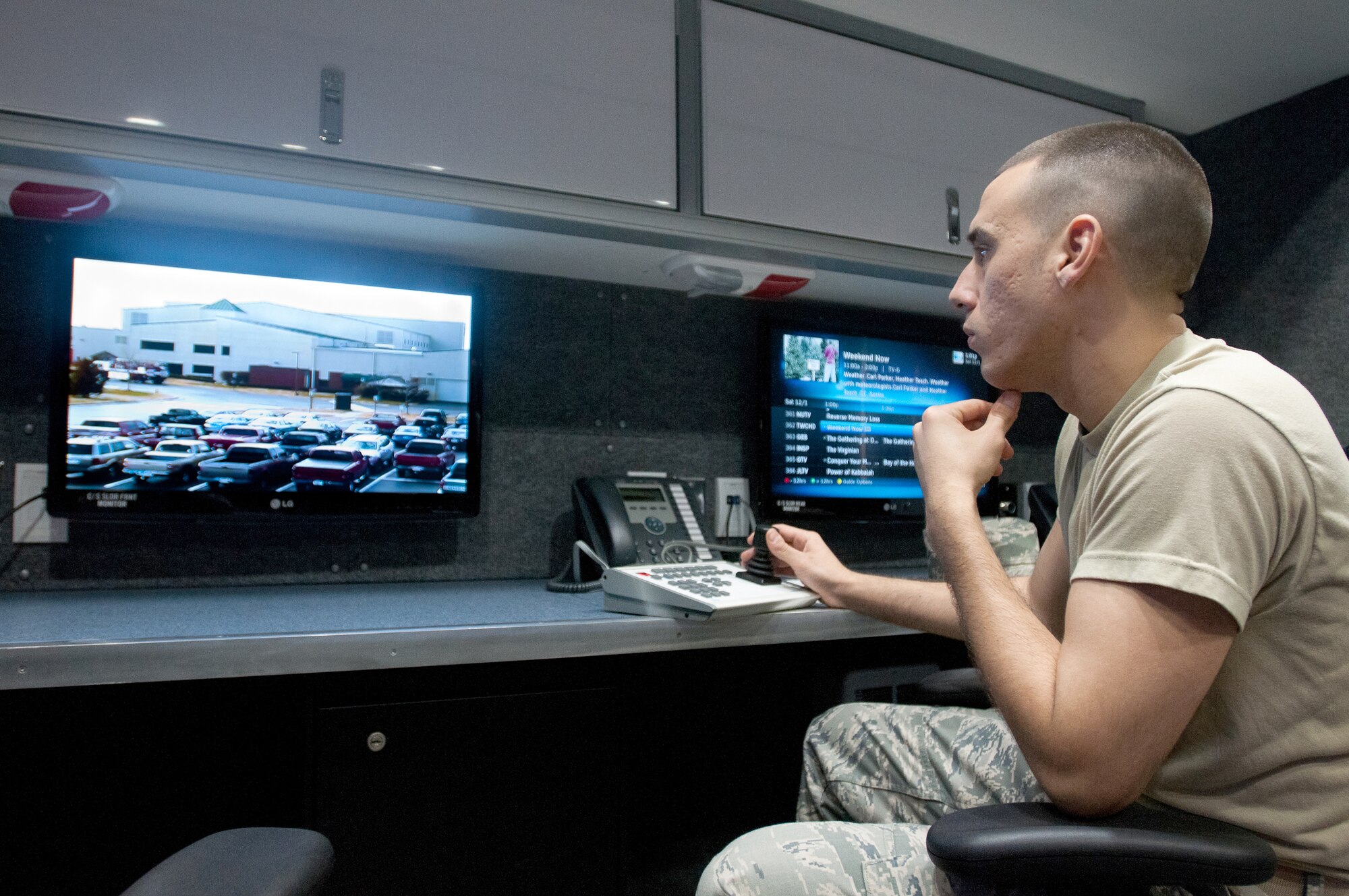 Kentucky Air National Guard Senior Airman Eric Finley, an emergency manager for the 123rd Civil Engineer Squadron, operates a surveillance camera in the unit’s new Mobile Emergency Operations Center in Louisville, Ky., on Dec. 1, 2012. The $750,000 MEOC features an on-board generator, a full suite of civilian communications capabilities and meeting room space. (U.S. Air Force photo by Staff Sgt. Maxwell Rechel)
