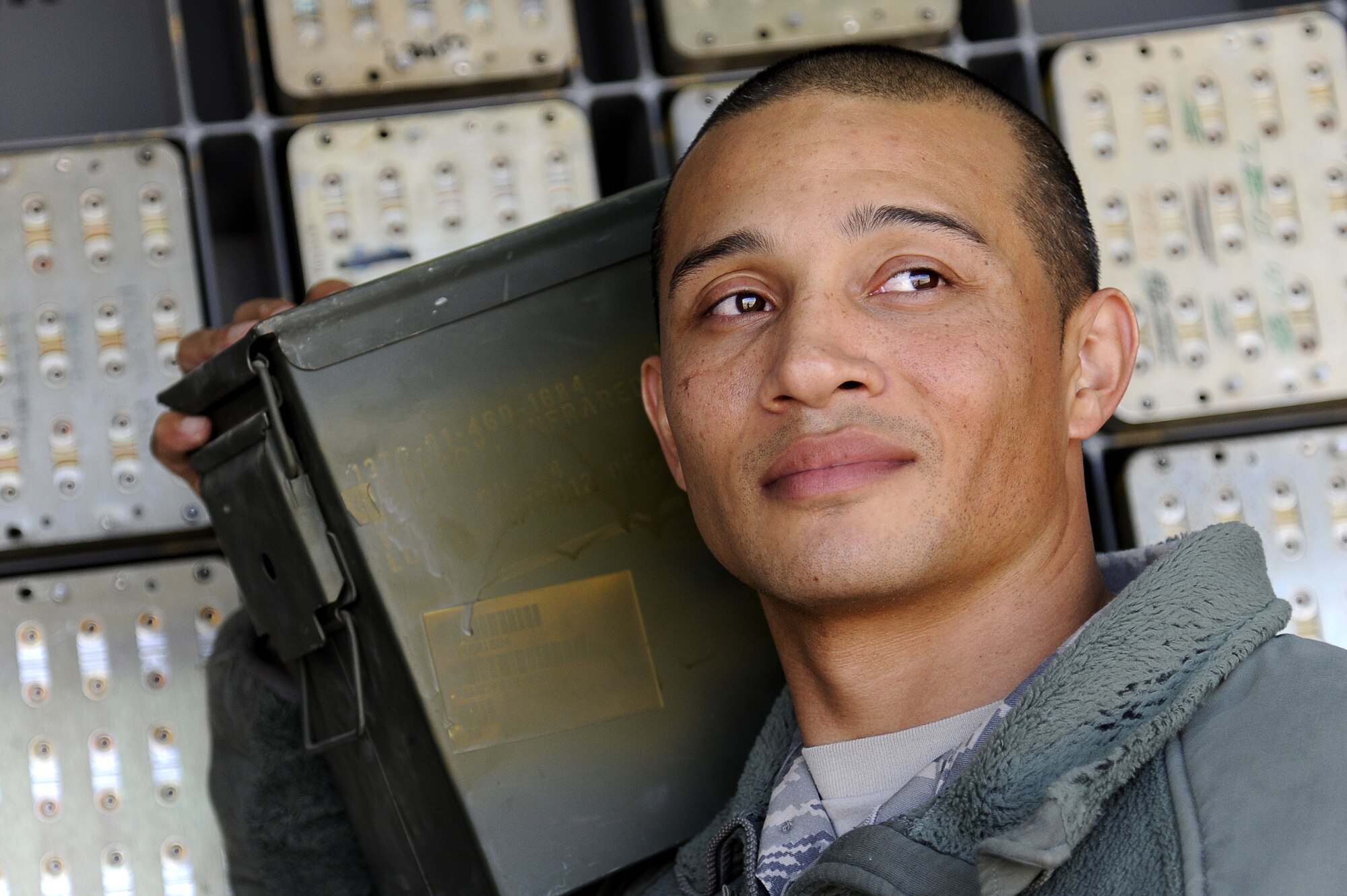 U.S. Air Force Staff Sgt. Cory Smith, 386th Expeditionary Maintenance Squadron, performs his duty as a munitions crew chief at an undisclosed deployed location in Southwest Asia on Dec. 28, 2012.  Smith was awarded this weeks “Rock Solid Warrior” designation by the 386 Air Expeditionary Wing.  (U.S. Air Force photo by Staff Sgt. Austin Knox)