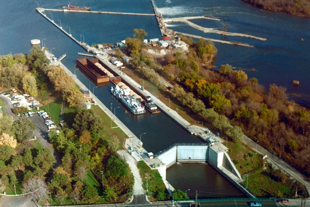 Brandon Road Lock and Dam is near Joliet, Illinois, 286 miles above the confluence of the Illinois River with the Mississippi River. The lock opened in 1933 and is one of five designed and partially constructed by the state of Illinois over a period from 1927 to 1930.