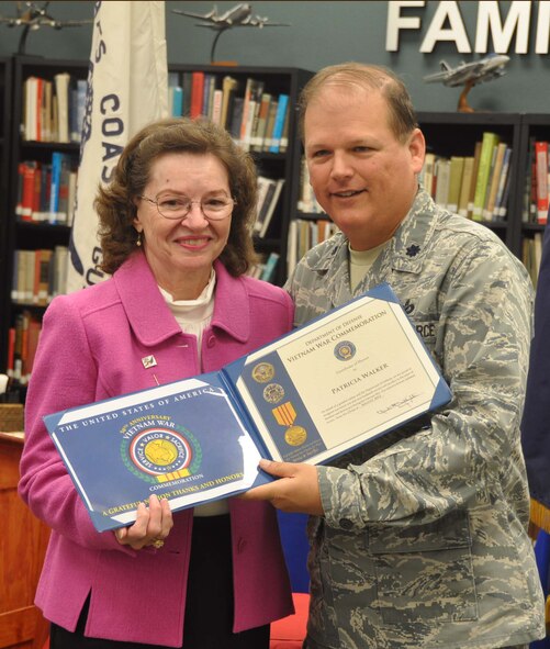 Lt. Col. Don Traud, director of Public Affairs for March Air Reserve Base, represented the Department of Defense as it recognized the sacrifices of the Vietnam War widows and their husbands at the March Field Air Museum last month. (U.S. Air Force photo by Megan Crusher)
