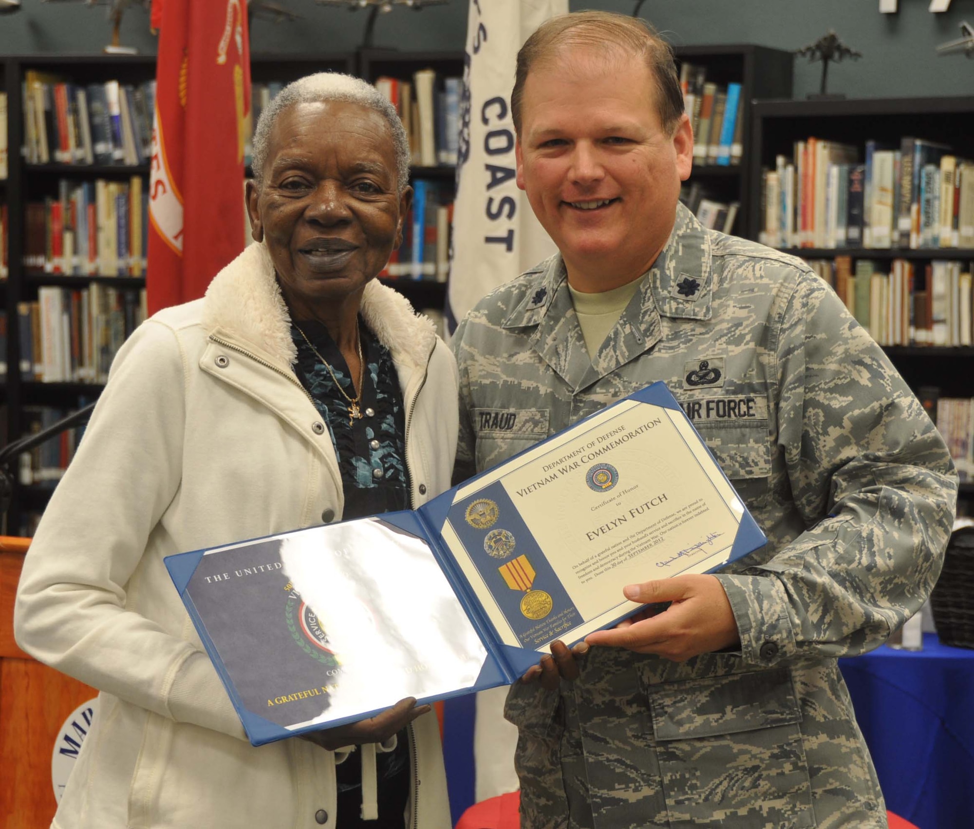 Lt. Col. Don Traud, Director of Public Affairs for March Air Reserve Base, represented the Department of Defense as it recognized the sacrifices of the Vietnam War widows and their husbands at the March Field Air Museum last month. (U.S. Air Force photo by Megan Crusher)