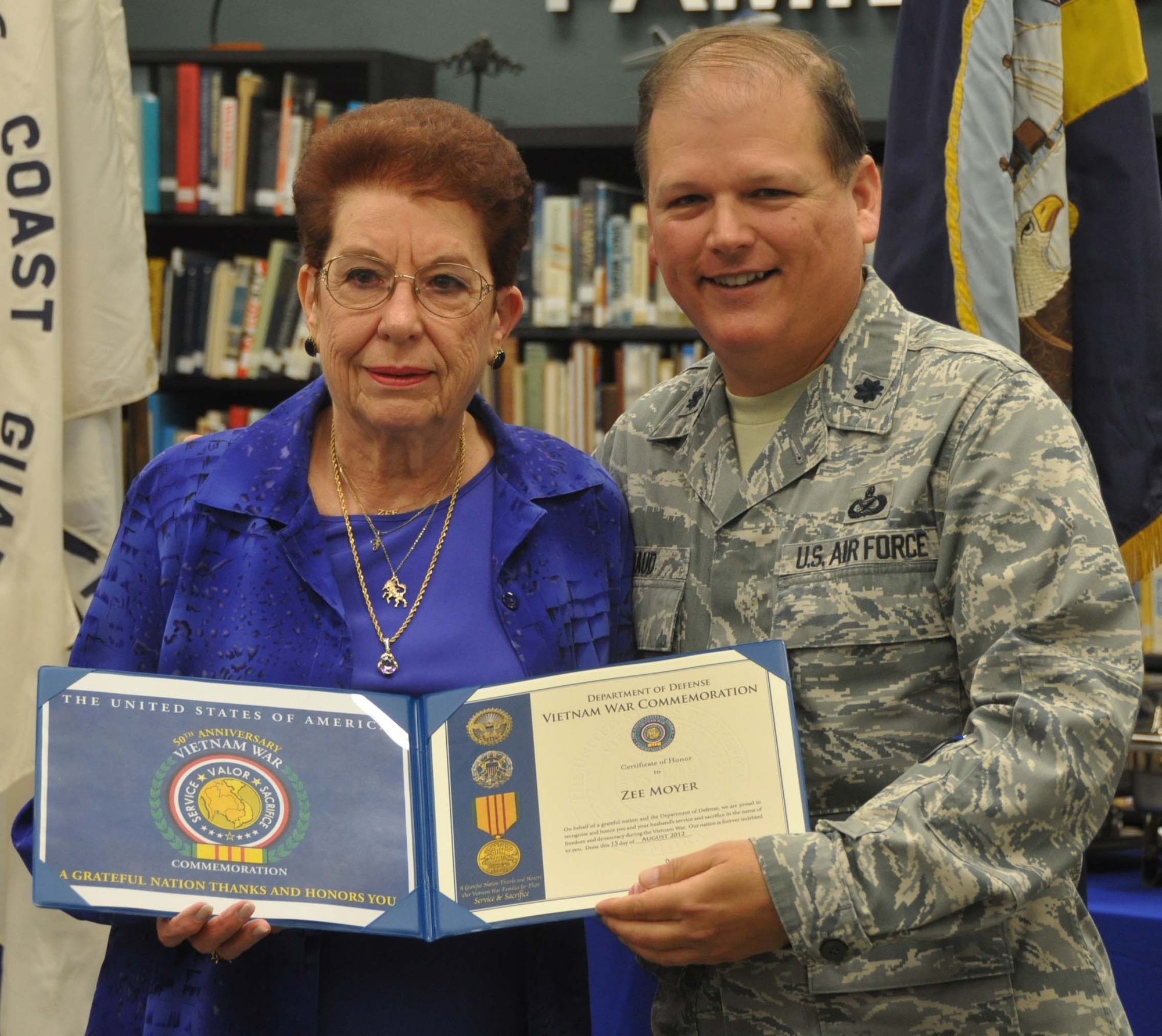 Lt. Col. Don Traud, Director of Public Affairs for March Air Reserve Base, represented the Department of Defense as it recognized the sacrifices of the Vietnam War widows and their husbands at the March Field Air Museum last month. (U.S. Air Force photo by Megan Crusher)