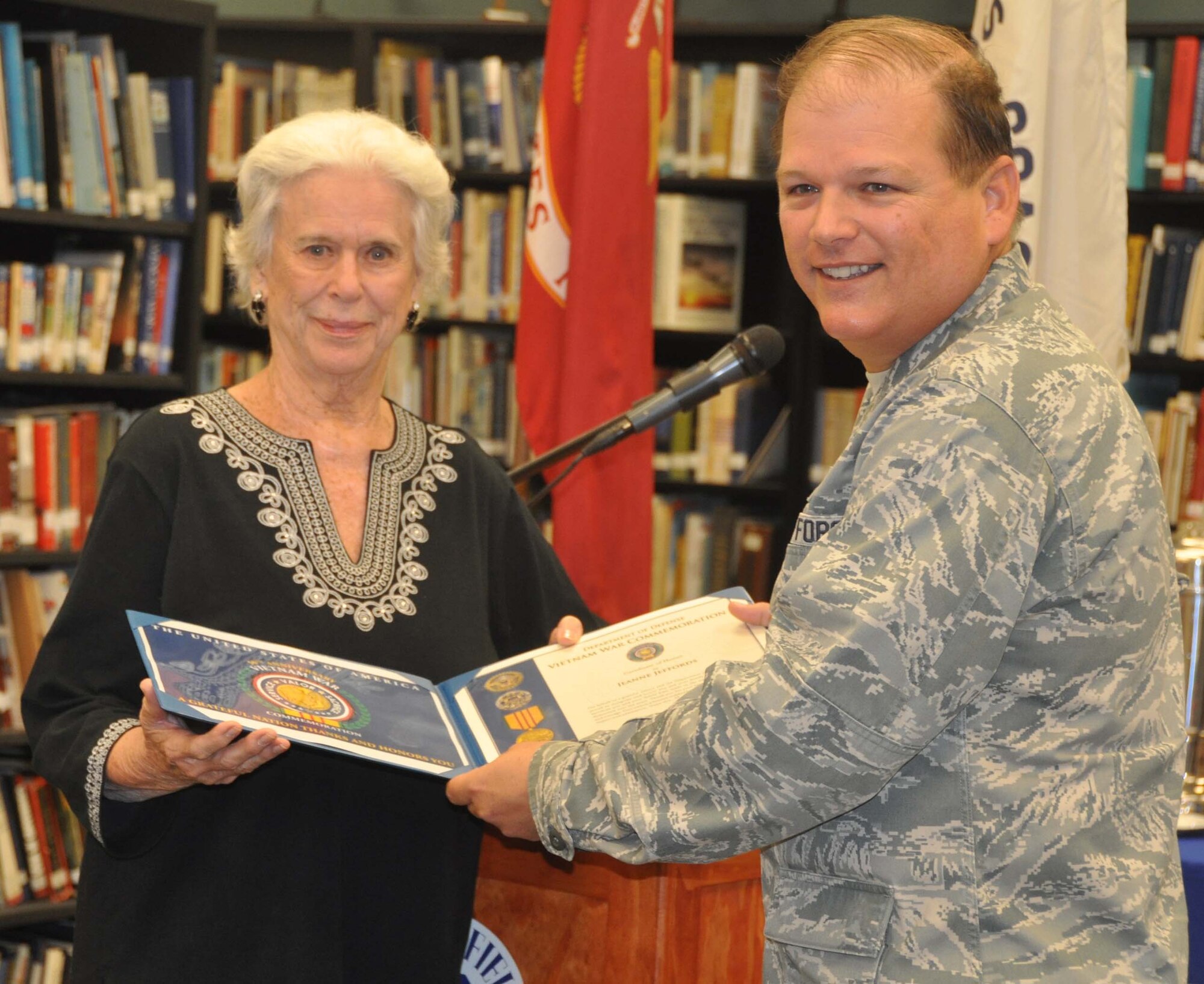 Lt. Col. Don Traud, Director of Public Affairs for March Air Reserve Base, represented the Department of Defense as it recognized the sacrifices of the Vietnam War widows and their husbands at the March Field Air Museum last month. (U.S. Air Force photo by Megan Crusher)