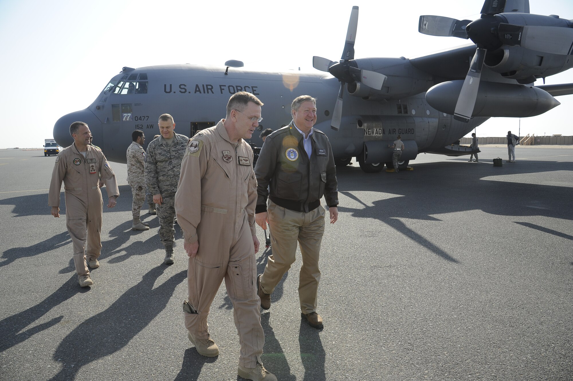Secretary of the Air Force Michael Donley is welcomed by Col. Shawn Farrow, 386th Air Expeditionary Wing commander, during his visit to the wing Dec. 30, 2012.  Donley and Chief Master Sgt. of the Air Force James Roy visited the wing as part of a multi-base tour of the region to thank Airmen for their service and to discuss Air Force issues.  (U.S. Air Force photo by Staff Sgt. Austin Knox)