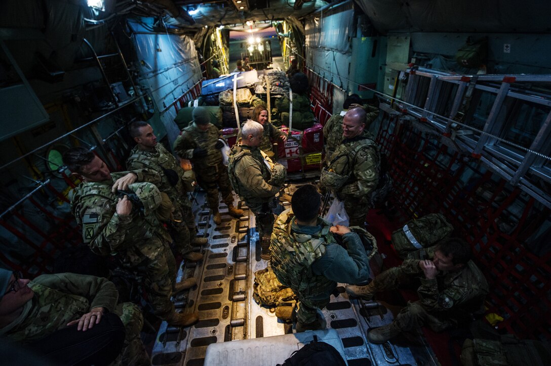 U.S. Air Forces Central Band "Total Force" gathers their gear Dec. 18, 2012, at Kandahar Airfield, Afghanistan. This was the first stop on the band's tour throughout Afghanistan, playing for U.S. and coalition service members. (U.S. Air Force photo/Staff Sgt. Jonathan Snyder)