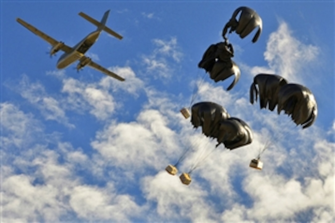 Supplies drop to U.S. soldiers deployed to the mountainous Paktya province on Forward Operating Base Lightning, Afghanistan, Dec. 23, 2012. Military leaders coordinated the air drop to resupply the base when adverse weather made roads through mountainous areas too difficult to traverse. 