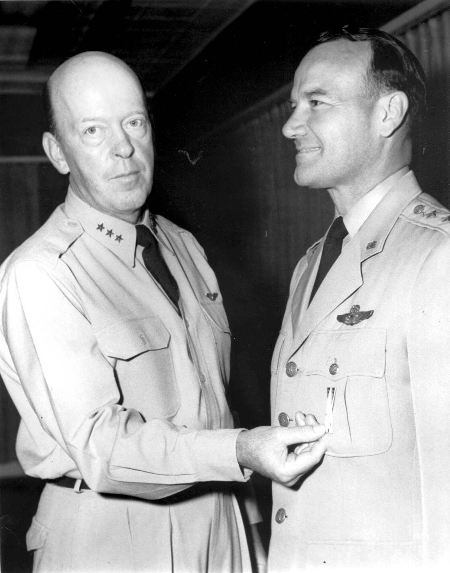 Maj. Gen. Ben Funk receives the first Air Materiel Command Missile Badge in 1958. (Photo courtesy of SMC History Office)