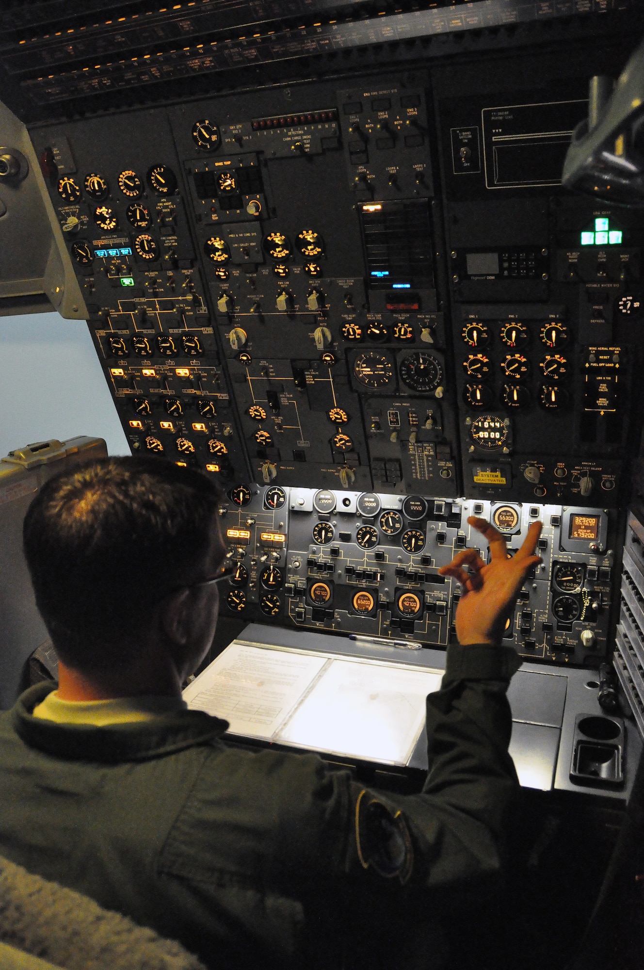 Staff Sgt. Daniel Ford, 660th Aircraft Maintenance Squadron KC-10 Extender flight engineer, proceeds with routine training Tuesday on the KC-10 flight simulator (U.S. Air Force photo/Airman 1st Class Madelyn Ottem)