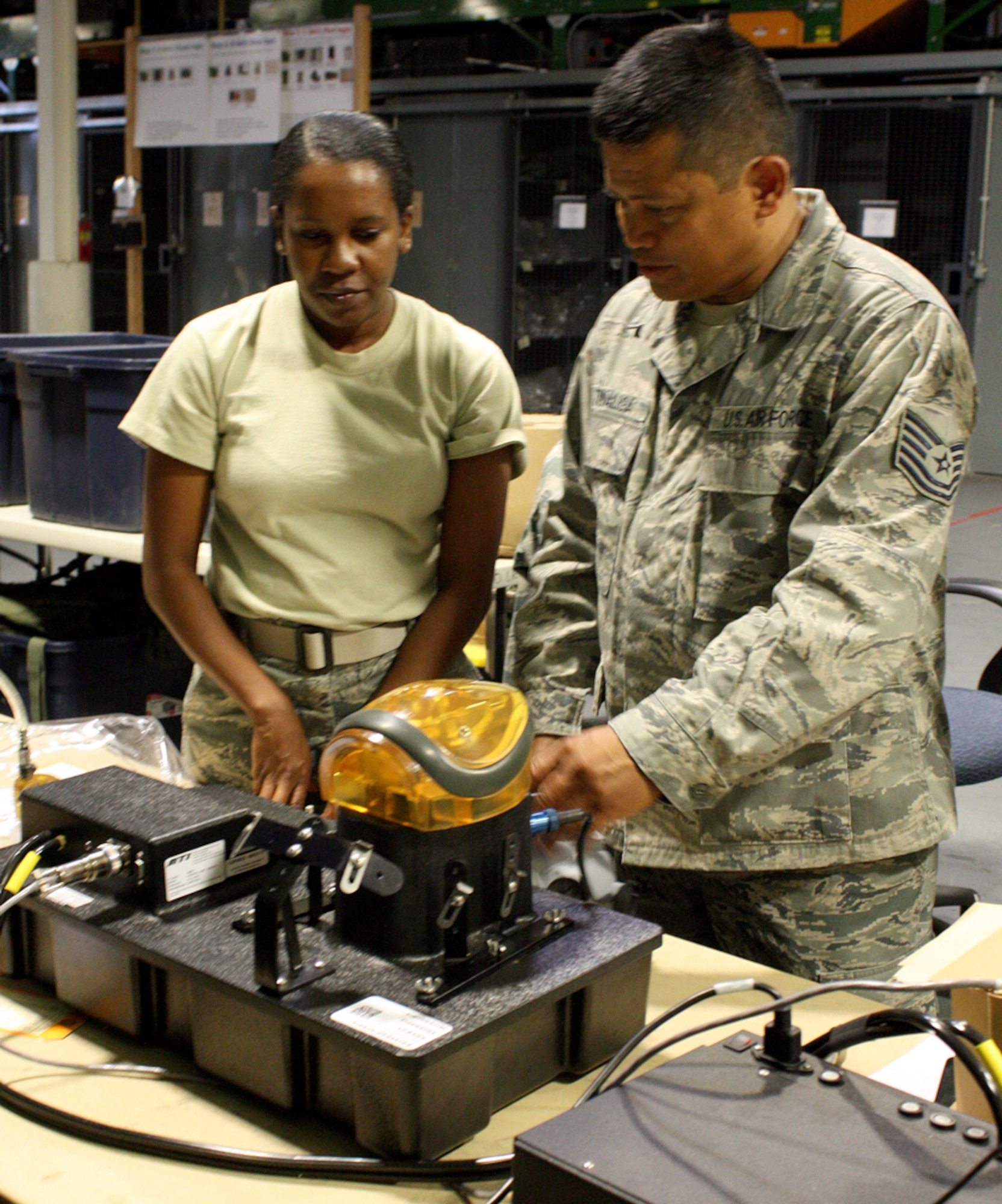 Airman 1st Class Alivia Hampton, a material management specialist with the 940th Logistics Readiness Squadron, conducts a leakage test on a gas mask. The 940th Wing Reservist from Beale Air Force Base, Calif., completed her seasonal training program at Travis Air Force Base, Calif., after graduating from Basic Military Training at Lackland Air Force Base, Texas. (U.S. Air Force photo by SrA Amelia Leonard)