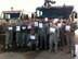 Fire fighters with the 405th Expeditionary Civil Engineer Squadron in Southwest Asia receive thank-you cards from school children expressing appreciation for the deployed military members’ service.  A group of Reservists from the 940th Wing at Beale Air Force Base, Calif., are currently on an extended deployment with the 405 ECES. (Courtesy photo)