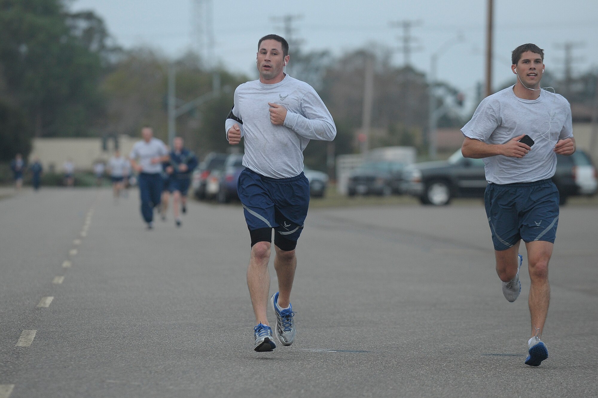 VANDENBERG AIR FORCE BASE, Calif. -- Members of the 30th Space Wing run during the monthly Wing Run here at the base parade grounds Tuesday, Jan. 31, 2012. This was the first wing run for the wing's new commander, Col. Nina Armagno. (U.S. Air Force photo/Staff Sgt. Andrew Satran) 

  
