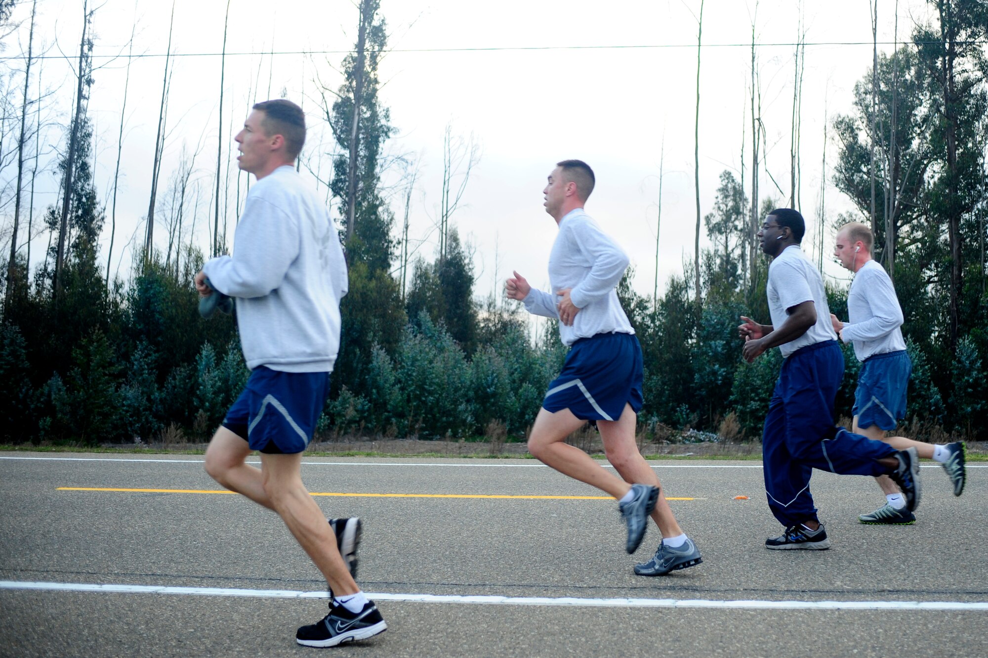 VANDENBERG AIR FORCE BASE, Calif. -- Members of the 30th Space Wing run during the monthly Wing Run here at the base parade grounds Tuesday, Jan. 31, 2012. This was the first wing run for the wing's new commander, Col. Nina Armagno. (U.S. Air Force photo/Staff Sgt. Andrew Satran) 

 
 