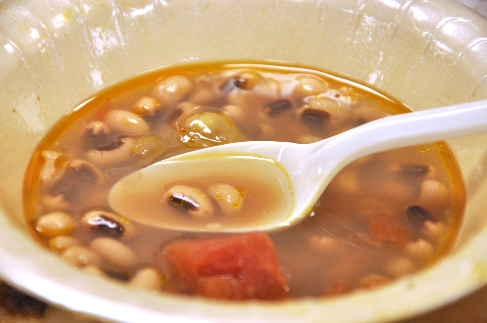 Black-eyed pea soup was among the dishes served at January’s Singles’ International Gourmet Meal Opportunity held in the Community Chapel Activity Center at Vance Air Force Base, Okla., Jan. 30. Approximately 220 single Airmen and family members of deployed Airmen attended. Twenty-five volunteers from the 71st Mission Support Group also prepared and served vegetable pizza, cheddar-cheese biscuits, chicken breasts, salad and various desserts. (U.S. Air Force photo/ 2nd Lt. Thomas Barger) 