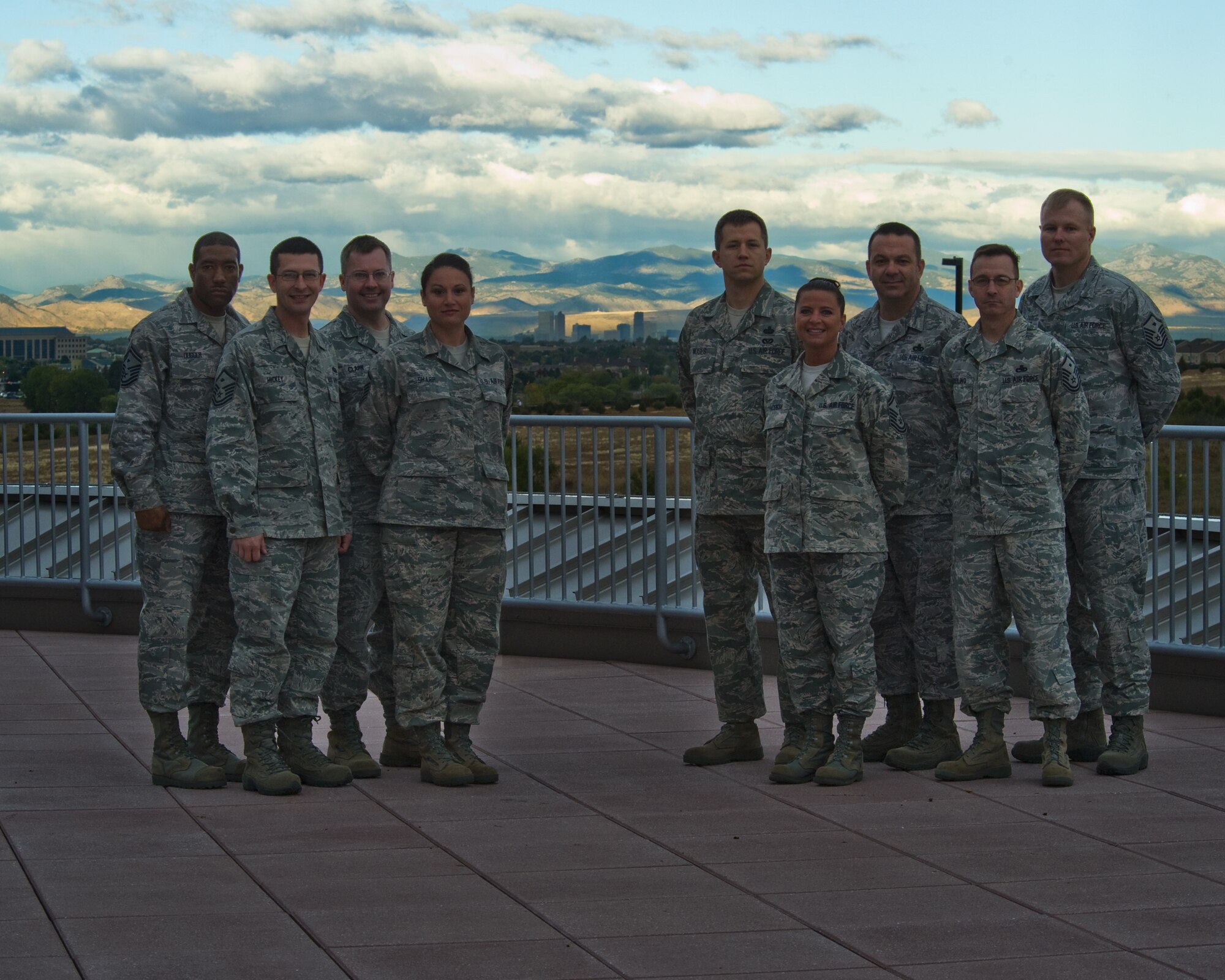 BUCKLEY AIR FORCE BASE, Colo. - Team Buckley First Sergeants stand for a group photo with the skyline of Denver behind them. (U.S. Air Force photo by: Airman 1st Class Phillip Houk)