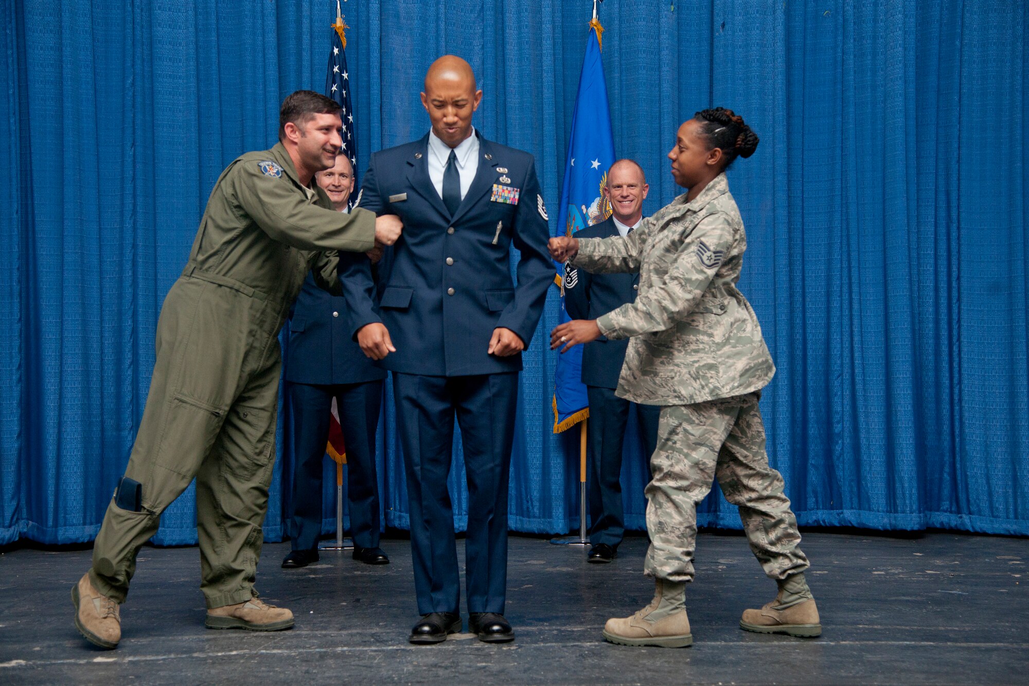 U.S. Air Force Tech. Sgt. Curt Mitchell, 23rd Wing ground safety, is promoted to the rank of E-6 at Moody Air Force Base Ga., Jan. 31, 2012. It is an Air Force tradition to have the stripes punched after promotion as a sign of solidity. (U.S. Air Force Photo by Airmen 1st Class Paul Francis/Released)
