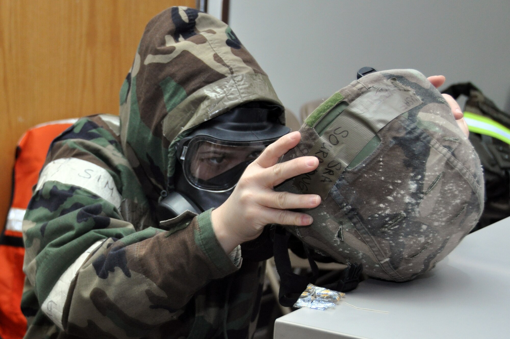 Senior Airman Lavessia Souravang, 51st Medical Operations Squadron, prepares for an attack Feb. 1, 2012, during operational readiness exercise Beverly Bulldog 12-01 at Osan Air Base, Republic of Korea. (U.S. Air Force photo/Airman 1st Class Michael Battles)