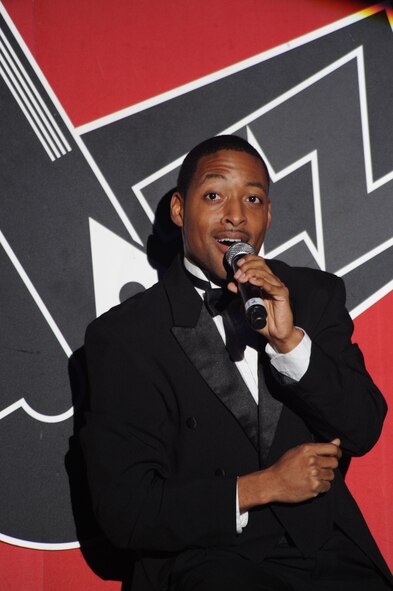 U.S. Air Force Staff Sgt. Derek Speights, Tops in Blue vocalist, sings during a performance Jan. 31, 2012, Patriot Hall, Sumter, S.C. The 2011 Tops in Blue tour, entitled “Rhythm Nation,” brings to life American music from the early 1900s through today. (U.S. Air Force photo by Airman 1st Class Tabatha McCarthy/Released)