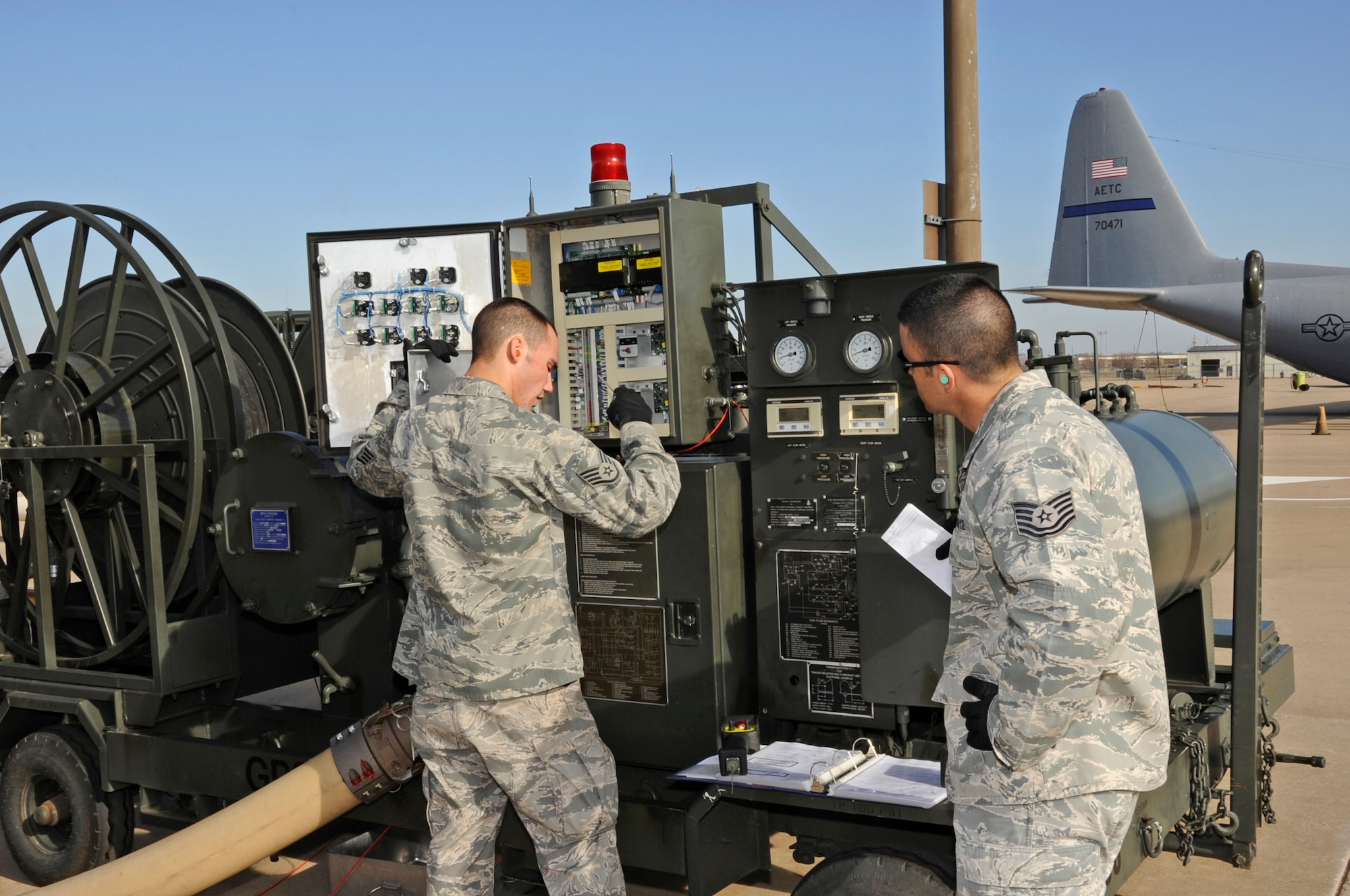 Airmen cover start-up procedures for refueling equipment Jan. 31, 2012 during the new Fuels Operational Readiness Capability Equipment (FORCE) training course taught by the 364th Training Squadron at Sheppard Air Force Base, Texas.  FORCE training looks at the fuels equipment of the future currently only being used in deployed locations. (U.S. Air Force photo/Frank Carter)
