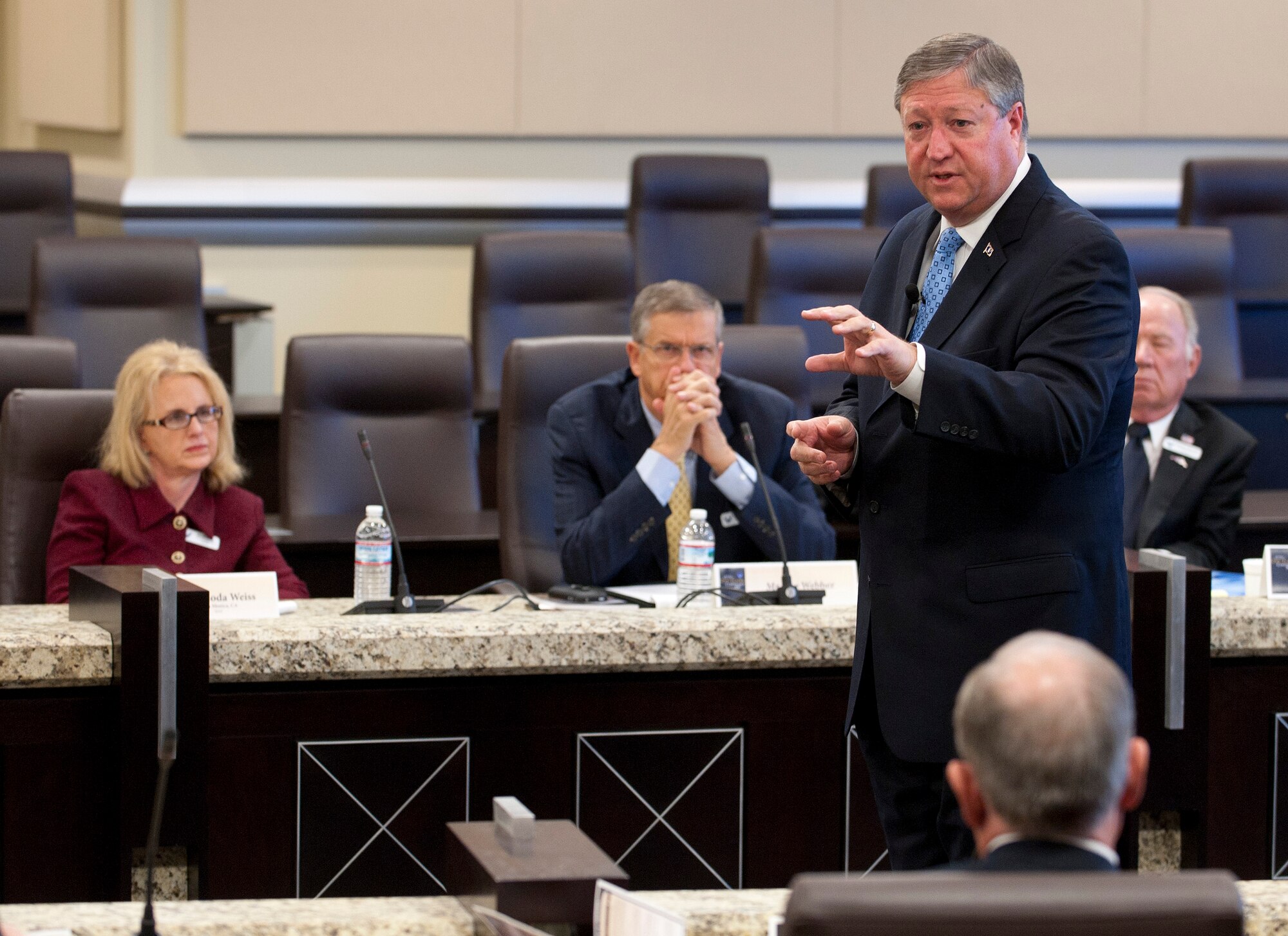 Secretary of the Air Force Michael Donley (standing upper right) speaks with civic leaders representing communities from across the U.S. during a conference Jan. 31, 2012, at Joint Base Andrews, Md. Hosted by Air Force Chief of Staff Gen. Norton Schwartz, the civic leaders attended briefings at the Pentagon and at Joint Base Andrews.  (U.S. Air Force photo/Jim Varhegyi)