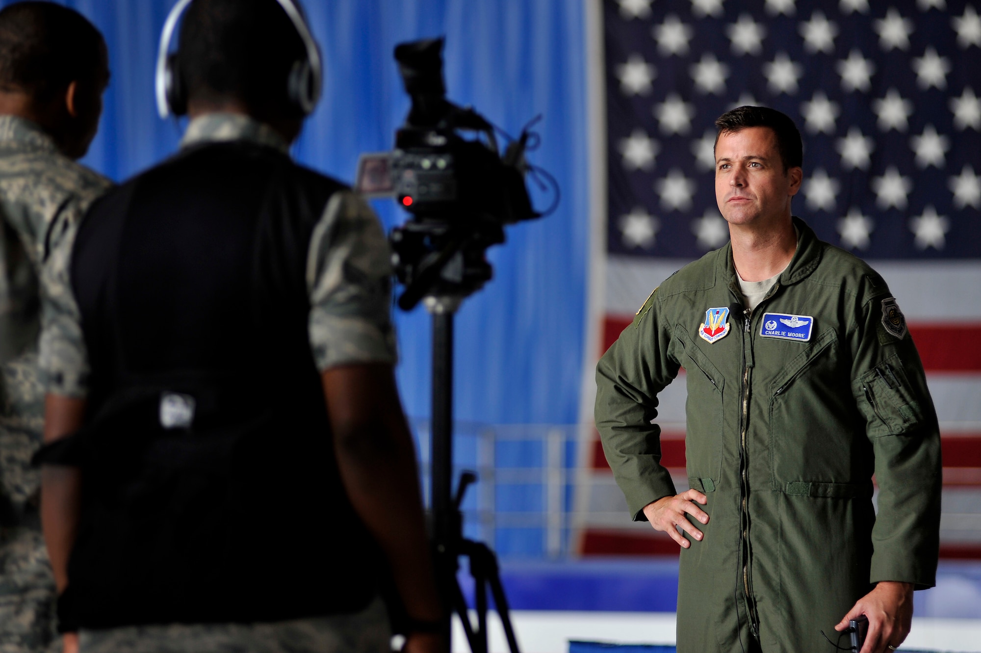 U.S. Air Force Col. Charles Moore, 20th Fighter Wing commander, waits to be interviewed about the upcoming Shaw Air Expo, Jan. 26, 2012, Shaw Air Force Base, S.C. 20th FW Public Affairs personnel coordinated the conference and provided internal media coverage of the event. Local media who attended were able to ask questions about the upcoming Shaw Air Expo take photos and interview the 20th Fighter Wing commander as well as other air expo coordinators. The Shaw Air Expo is scheduled for May 5-6, 2012. (U.S. Air Force photo by Senior Airman Kenny Holston/Released)