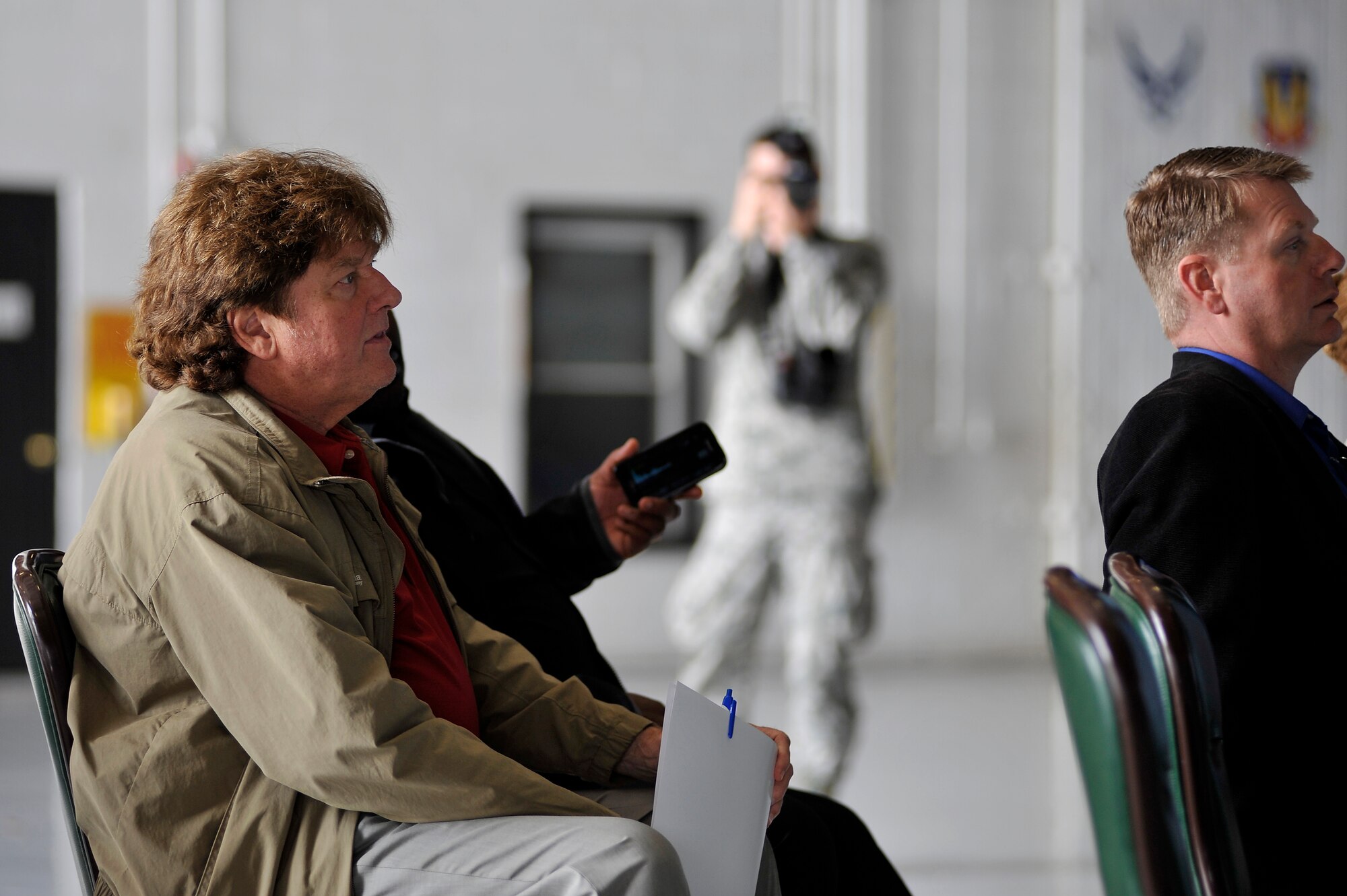 Local reporters listen intently and record during a press conference concerning the upcoming Shaw Air Expo, Jan. 26, 2012, Shaw Air Force Base, S.C. 20th Fighter Wing Public Affairs personnel coordinated the conference and provided internal media coverage of the event. Local media who attended were able to ask questions about the upcoming Shaw Air Expo, take photos and interview the 20th FW commander as well as other air expo coordinators. The Shaw Air Expo is scheduled for May 5-6, 2012. (U.S. Air Force photo by Senior Airman Kenny Holston/Released)