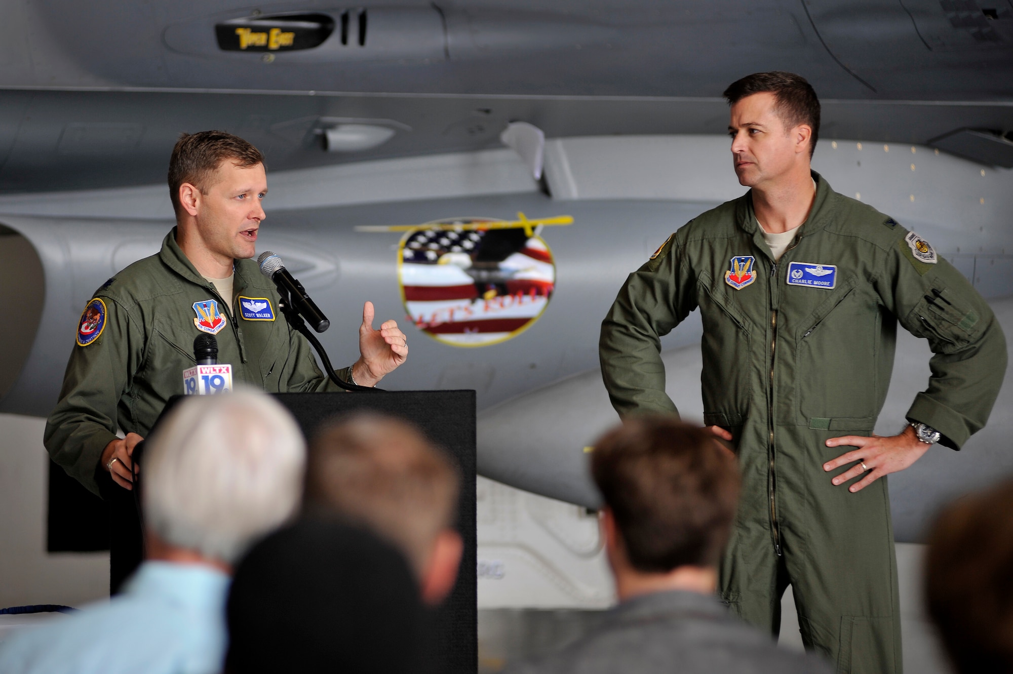 U.S. Air Force Lt. Col. Scott Walker, Shaw Air Expo director (left), and Col. Charles Moore, 20th Fighter Wing commander, speak to local media agencies and Sumter County officials during a press conference, Jan. 26, 2012, Shaw Air Force Base, S.C. Local media were able to ask questions about the upcoming Shaw Air Expo, take photos and interview personnel. The Shaw Air Expo is scheduled for May 5-6, 2012. (U.S. Air Force photo by Senior Airman Kenny Holston/Released)