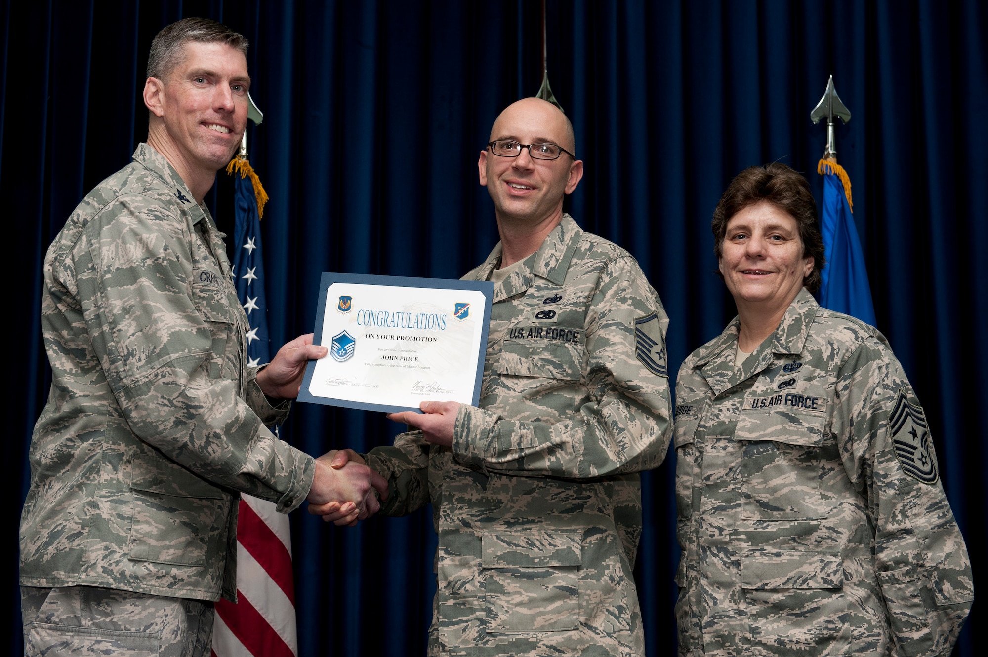 John Price, 39th Logistics Readiness Squadron, is promoted to the rank of master sergeant Jan. 31, 2012, at the Club Complex ballroom at Incirlik Air Base, Turkey. (U.S. Air Force photo by Tech. Sgt. Michael B. Keller/Released)