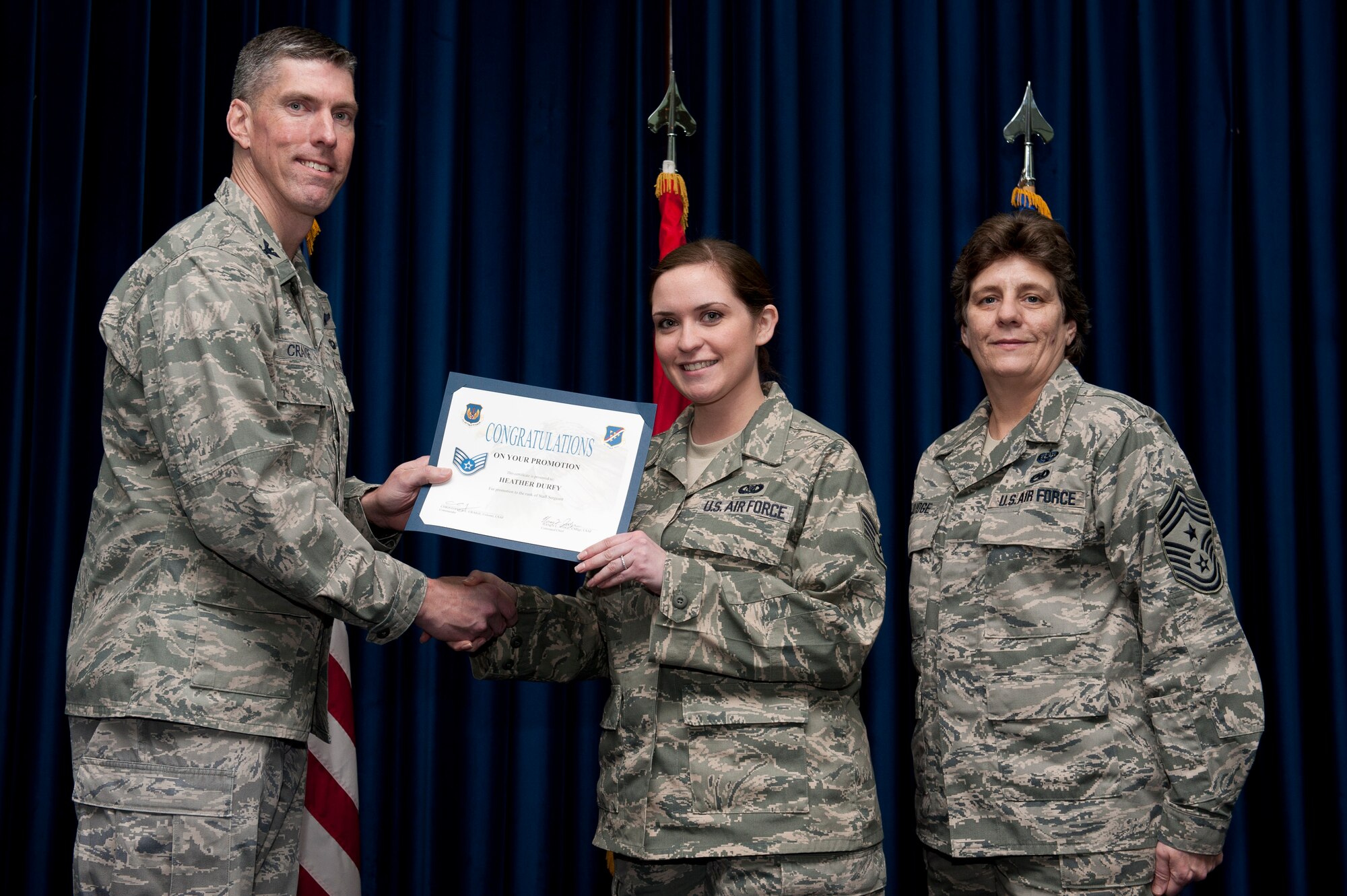 Heather Durfy, 728th Air Mobility Squadron, is promoted to the rank of staff sergeant Jan. 31, 2012, at the Club Complex ballroom at Incirlik Air Base, Turkey. (U.S. Air Force photo by Tech. Sgt. Michael B. Keller/Released)