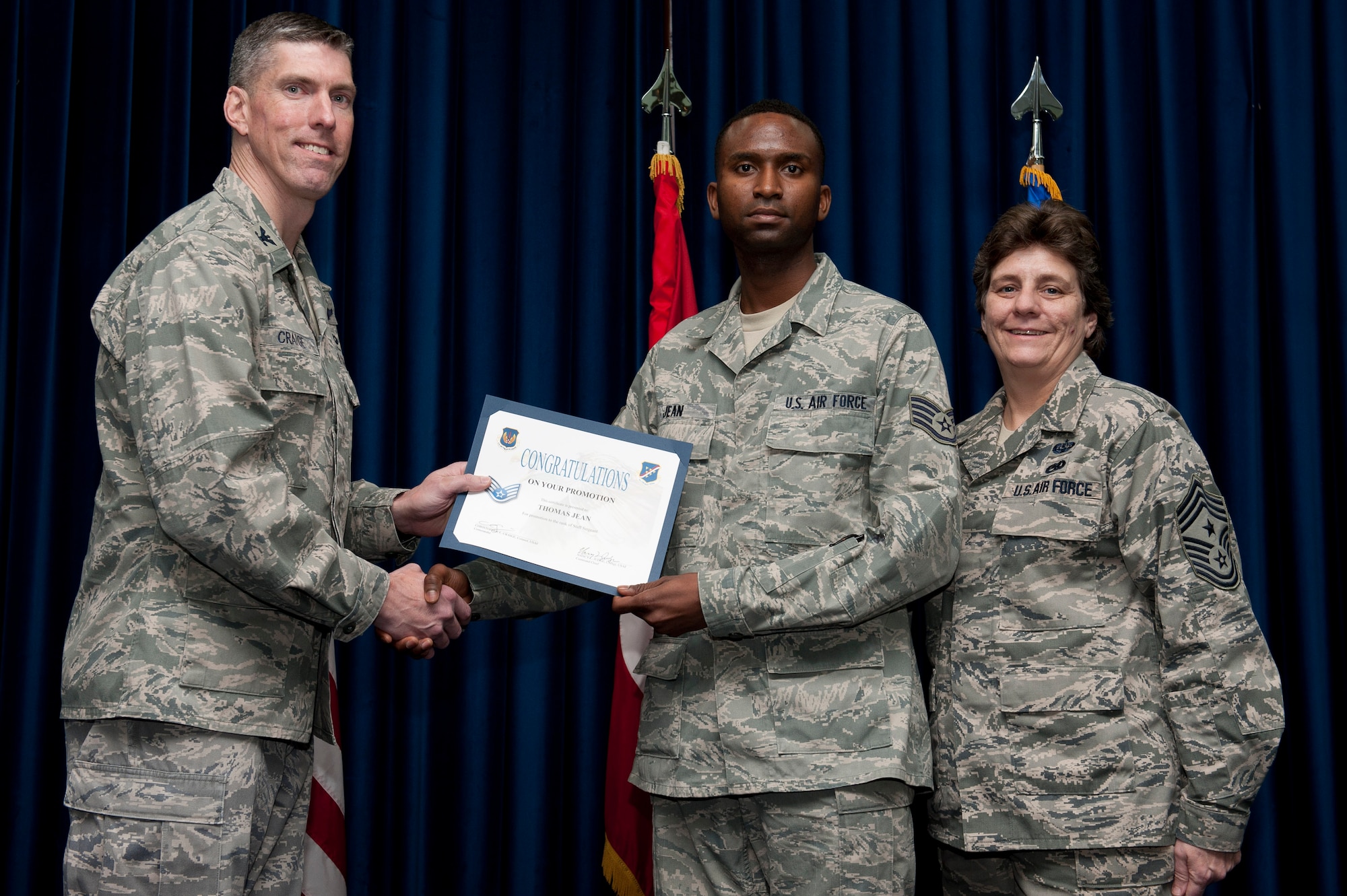 Thomas Jean, 39th Communications Squadron, is promoted to the rank of staff sergeant Jan. 31, 2012, at the Club Complex ballroom at Incirlik Air Base, Turkey. (U.S. Air Force photo by Tech. Sgt. Michael B. Keller/Released)