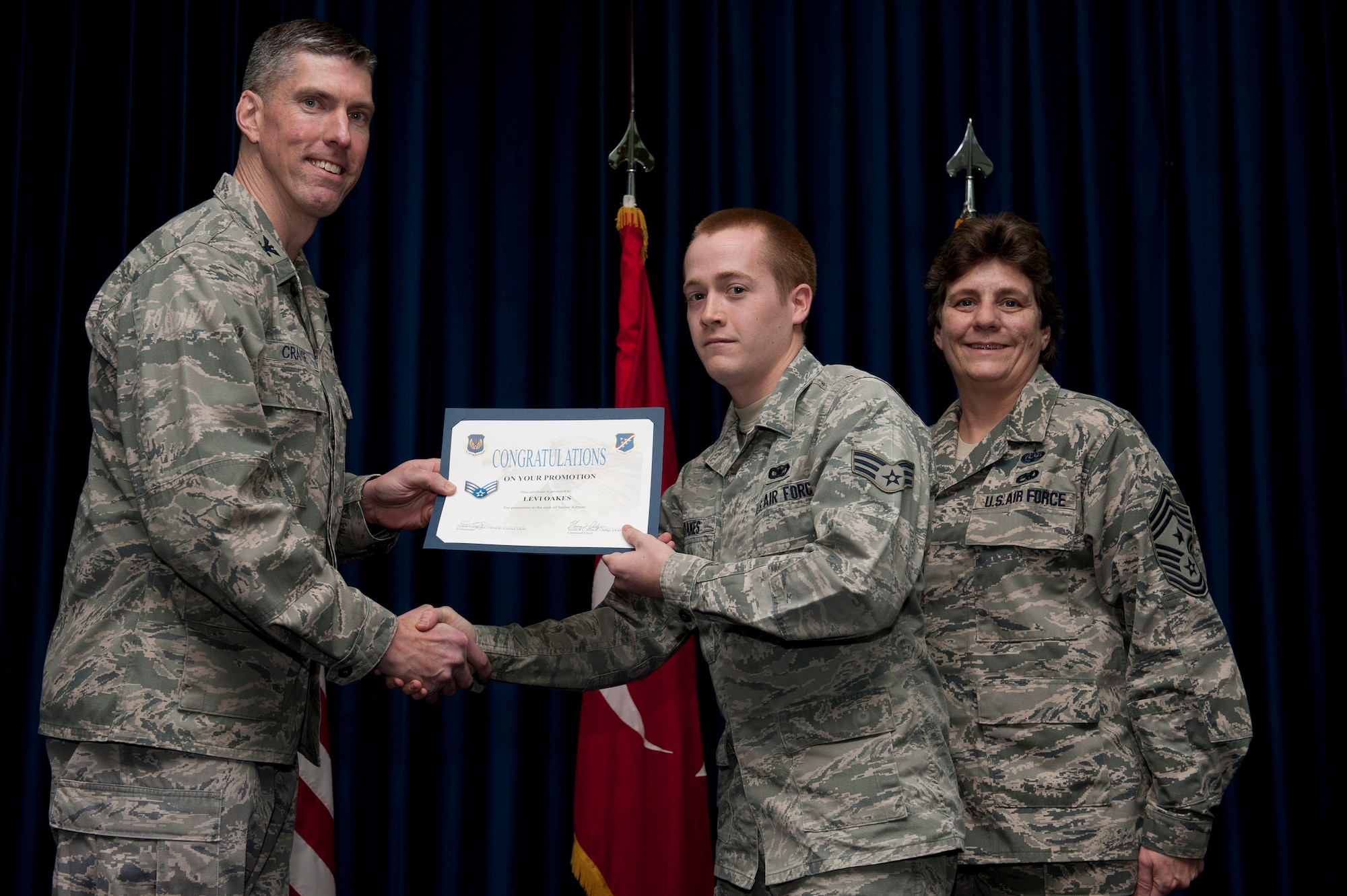 Levi Oakes, 39th Security Forces Squadron, is promoted to the rank of senior airman Jan. 31, 2012, at the Club Complex ballroom at Incirlik Air Base, Turkey. (U.S. Air Force photo by Tech. Sgt. Michael B. Keller/Released)
