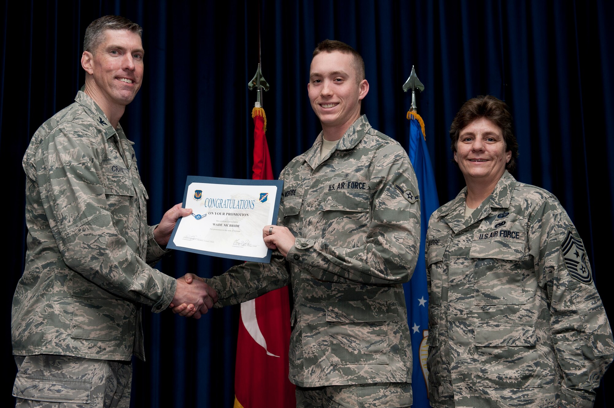 Wade McBride, 39th Medical Support Squadron, is promoted to the rank of airman Jan. 31, 2012, at the Club Complex ballroom at Incirlik Air Base, Turkey. (U.S. Air Force photo by Tech. Sgt. Michael B. Keller/Released)