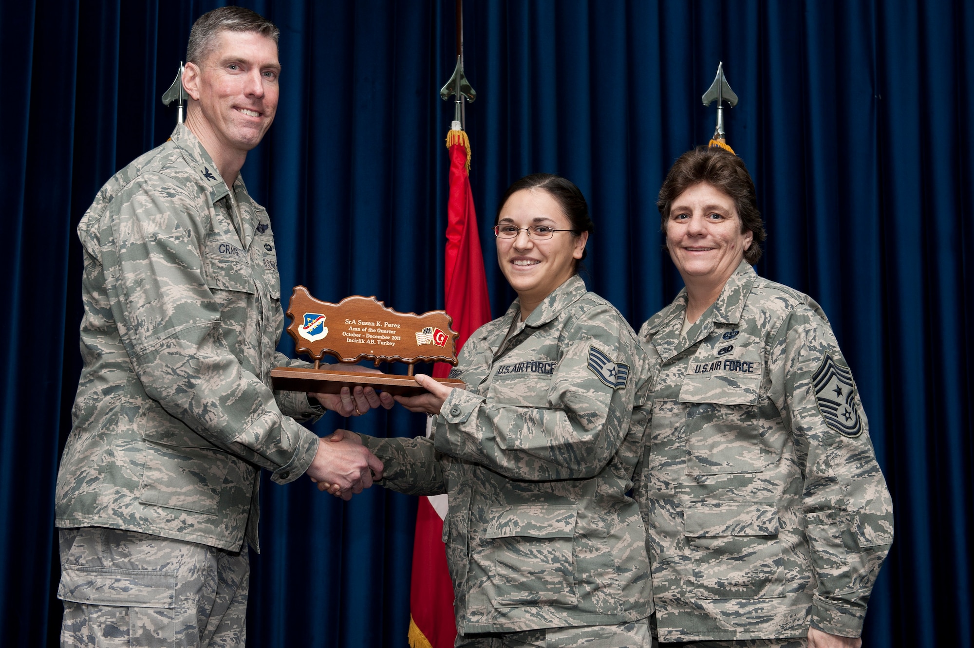 Staff Sgt. Susan Perez, 39th Medical Operations Squadron, receives the wing-level Airman of the Quarter Award Jan. 31, 2012, at the Club Complex ballroom at Incirlik Air Base, Turkey. (U.S. Air Force photo by Tech. Sgt. Michael B. Keller/Released)