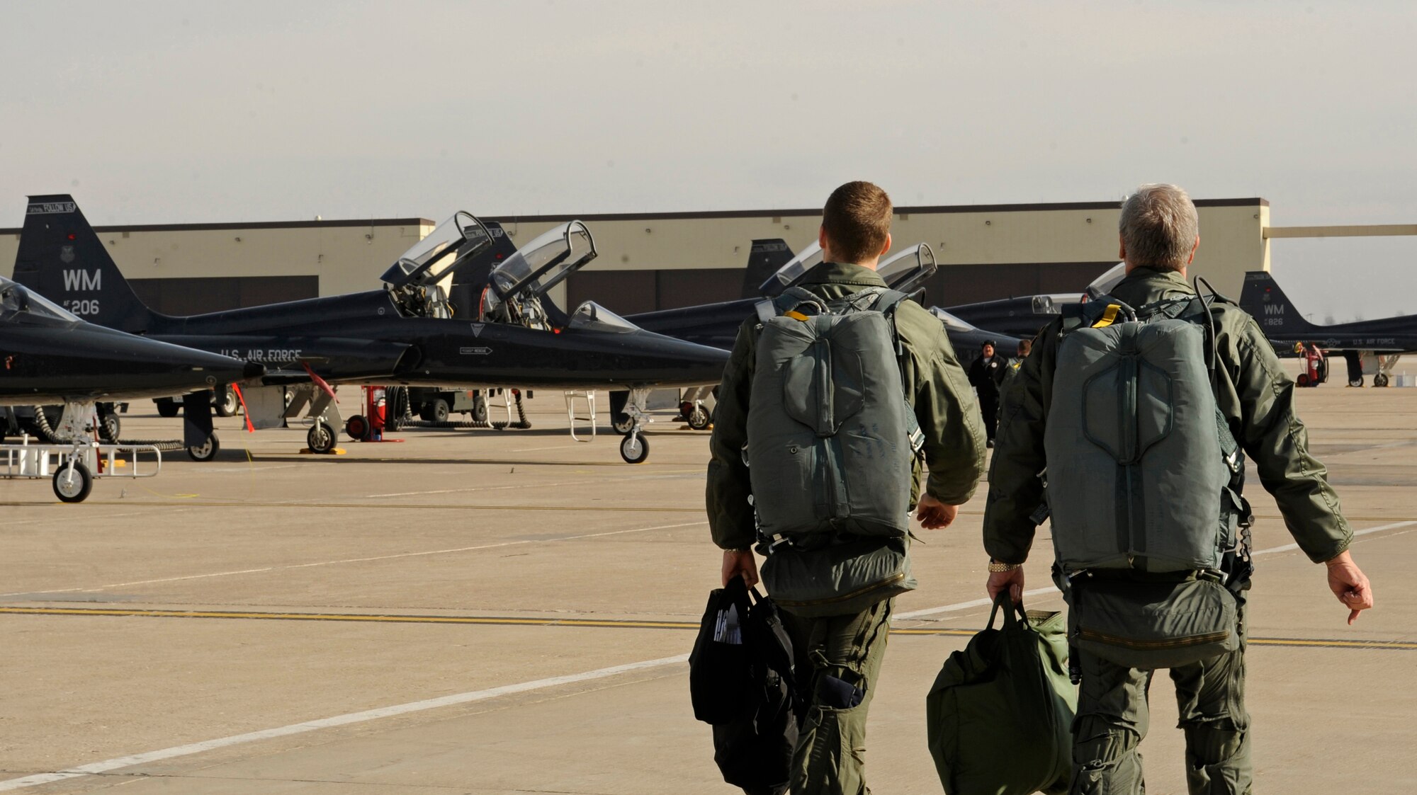 WHITEMAN AIR FORCE BASE, Mo. -- Capt. Justin Meyer, 13th Bomb Squadron pilot, and Joe Scallorns, Air Force Global Strike Command Civic Leader Program and board member of Whiteman Air Force Base's Base Community Council, prepare for an incentive flight on a T-38 Talon here Jan. 26. The purpose of the incentive flight gives him a deeper understanding of the full spectrum of Air Force Global Strike Operations.  (U.S. Air Force photo by Staff Sgt. Alexandra M. Boutte) (RELEASED)