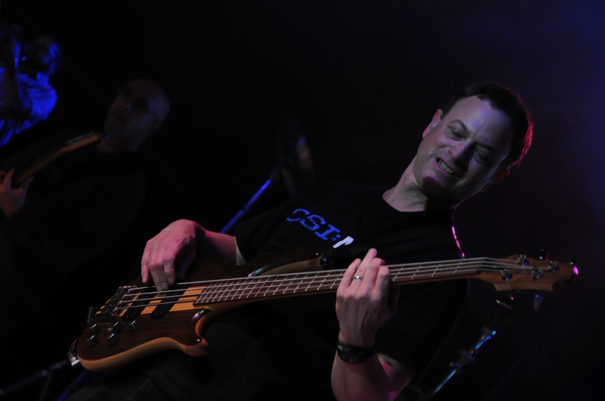 SOUTHWEST ASIA -- Emmy/Golden Globe Award winning actor Gary Sinise and the Lt. Dan Band perform for troops in an undisclosed location in Southwest Asia on Jan. 28, 2012. Sinise and the Lt. Dan Band were formed by the Academy Award-nominated Sinise and Vietnam veteran Kimo Williams. The band has performed numerous shows across the world to support members of the U.S. military. (U.S. Air Force photo by Staff Sgt. James Lieth/Released)