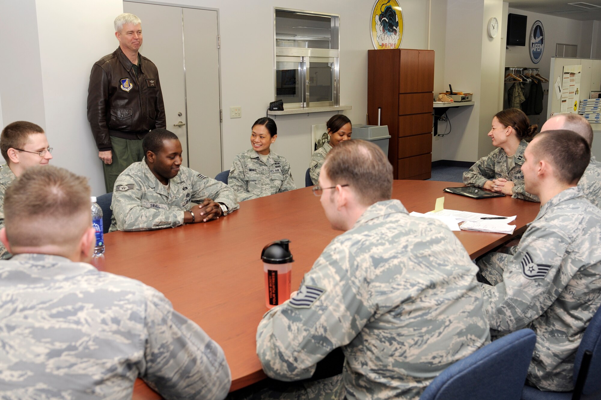 MISAWA AIR BASE, Japan - Col. Al Wimmer, 35th Fighter Wing vice commander, listens to Airmen of the 35th Civil Engineer Squadron as they talk about how to deal with stress during resiliency day here, Jan. 30. Airmen with the 35 FW took time out of their busy schedules to think about how each person can be more resilient and a better wingman. (U.S. Air Force photo/Tech. Sgt. Marie Brown)
