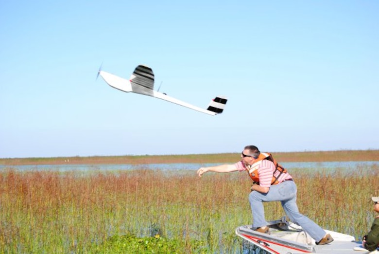 LAKE OKEECHOBEE, Fla. — With a mighty heave, Damon Wolfe, geodesist with the U.S. Army Corps of Engineers Jacksonville District, launches the NOVA Unmanned Aerial Vehicle (UAV) on a flight over Lake Okeechobee. USACE used photos from the UAV to track the progress of various plant species at the lake.
