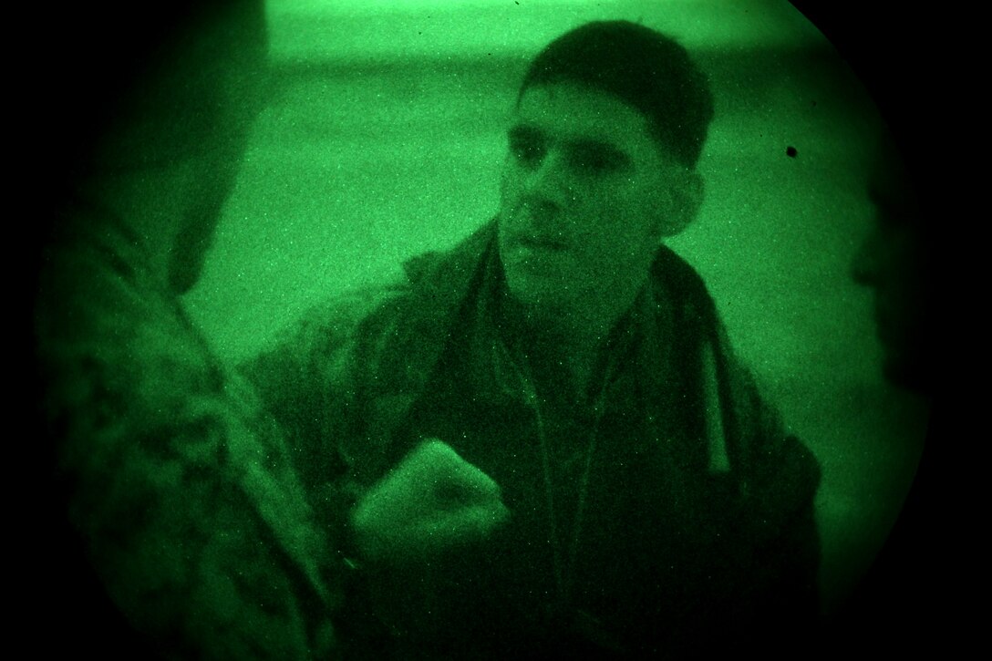 Marines conduct a safety brief before a night helocast training exercise at Camp Pendleton, Calif., Feb. 1. Marines from Company A, 1st Reconnaissance Battalion, 1st Marine Division,  conducted helocasting with Japanese Rangers from the Japanese Ground Self Defense Force, as part of Exercise Iron Fist 2012, a bilateral training exercise between the 15th Marine Expeditionary Unit and the JGSDF.::r::::n:: ::r::::n::