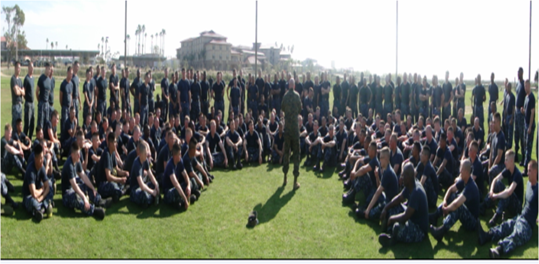 Students of FMST Class 2012020 get briefed on the proper ways to execute MCMAP (Marine Corps Martial Arts Program) moves, by Master Sergeant Bailey; Chief Instructor FMTB-W.