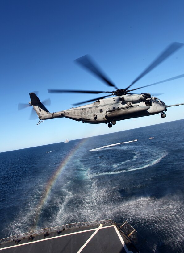 A CH-53E Super Stallion takes off after Marines with the Security Element Platoon, Headquarters and Service Company, Battalion Landing Team 1st Battalion, 2nd Marine Regiment, 24th Marine Expeditionary Unit, fast roped onto the USNS Laramie during a simulated Visit, Board, Search and Seizure Feb. 1, 2012.  The 24th MEU is conducting their Certification Exercise (CERTEX) with Iwo Jima Amphibious Ready Group scheduled Jan. 27 to Feb. 17, which includes a series of missions intended to evaluate and certify the unit for their upcoming deployment. The CH-53E helicopters are a detachment from Marine Heavy Helicopter Squadron 464 based at Marine Corps Air Station New River, N.C., and comprise part of Marine Medium Tiltrotor Squadron VMM-261 (Rein), which is the Aviation Combat Element for the 24th MEU.