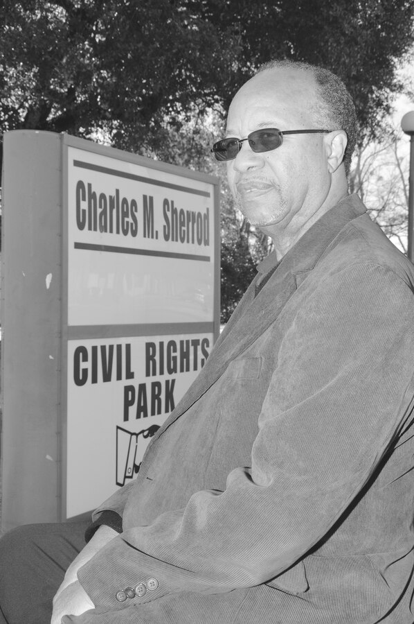 Charles M. Sherrod, a local civil rights activist, sits on a bench, Jan. 5, in the Civil Rights Park in Albany, Ga., that bears his name.