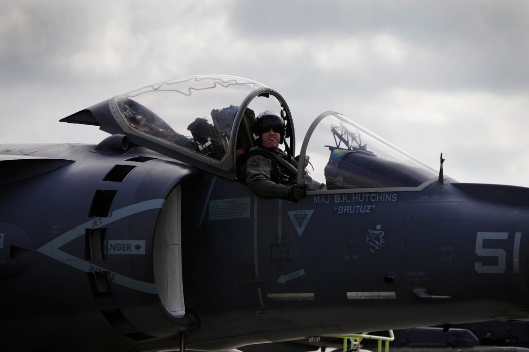 Maj. Ben Hutchins looks on at family and friends at the Marine Attack Squadron 231 homecoming Feb. 2, 2012, at the squadron's hangar aboard Marine Corps Air Station Cherry Point. Hutchins served as the officer in charge for VMA-231's AV-8B Harrier detachment that spent more than 10 months at sea attached to the 22nd Marine Expeditionary Unit.
