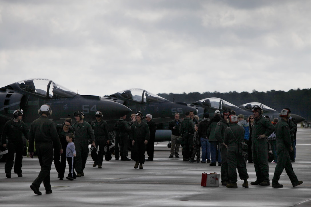 Friends and family reunite with their Marines Feb. 2, 2012, on the Marine Corps Air Station Cherry Point flight line. The Marines were part of a Marine Attack Squadron 231 detachment attached to the 22nd Marine Expeditionary Unit with six of the squadron's AV-8B Harriers. The detachment was at sea for more than 10 months, which is one of the longest MEU deployments since WWII, said Maj. Ben Hutchins, officer in charge for the VMA-231 detachment.