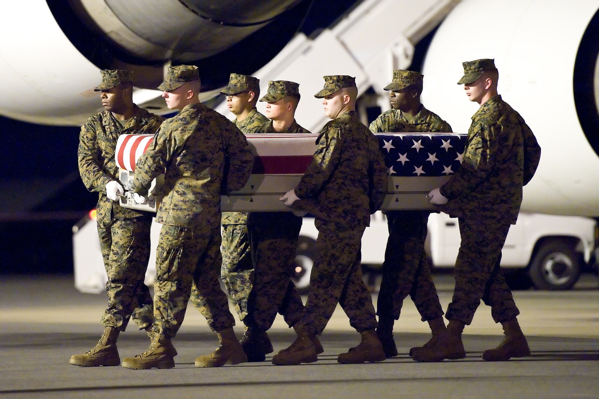 A U.S. Marine Corps carry team transfers the remains of Marine Lance Cpl. Edward J. Dycus, of Greenville, Miss., at Dover Air Force Base, Del., Feb. 2, 2012. Dycus was assigned to 2nd Battalion, 9th Marine Regiment, 2nd Marine Division, II Marine Expeditionary Force, Camp Lejeune, N.C. (U.S. Air Force photo/Roland Balik)