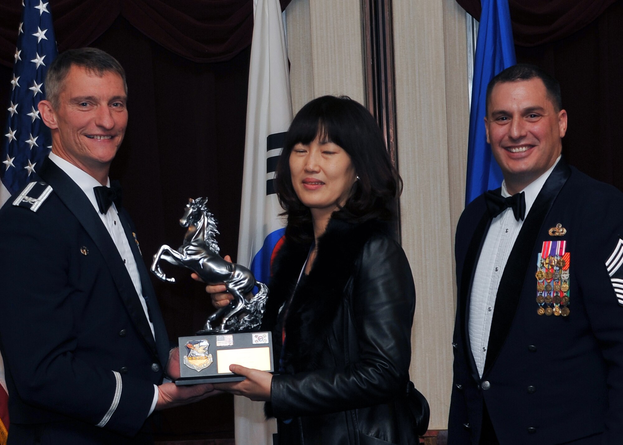 Ms. Hyon Suk Yi, 51st Fighter Wing Associate Unit Civilian of the Year