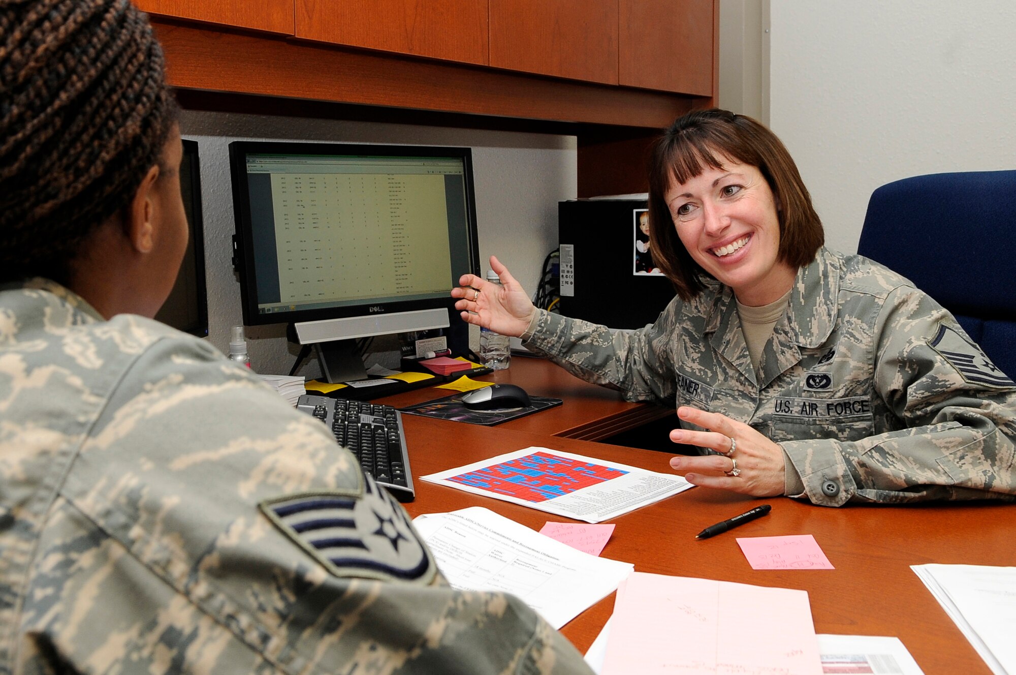 U.S. Air Force Master Sgt. Michele Deaner, career assistance advisor, 354th Fighter Wing, provides career counseling to an Airman on Jan. 27, 2012 at Eielson Air Force Base, Alaska. Deaner conducts interviews with Airmen to assess each individual's career path and goals and seeks to help them make informed decisions based on individual needs with career guidance and information. (U.S. Air Force photo by Staff Sgt. Jim Araos/Released)