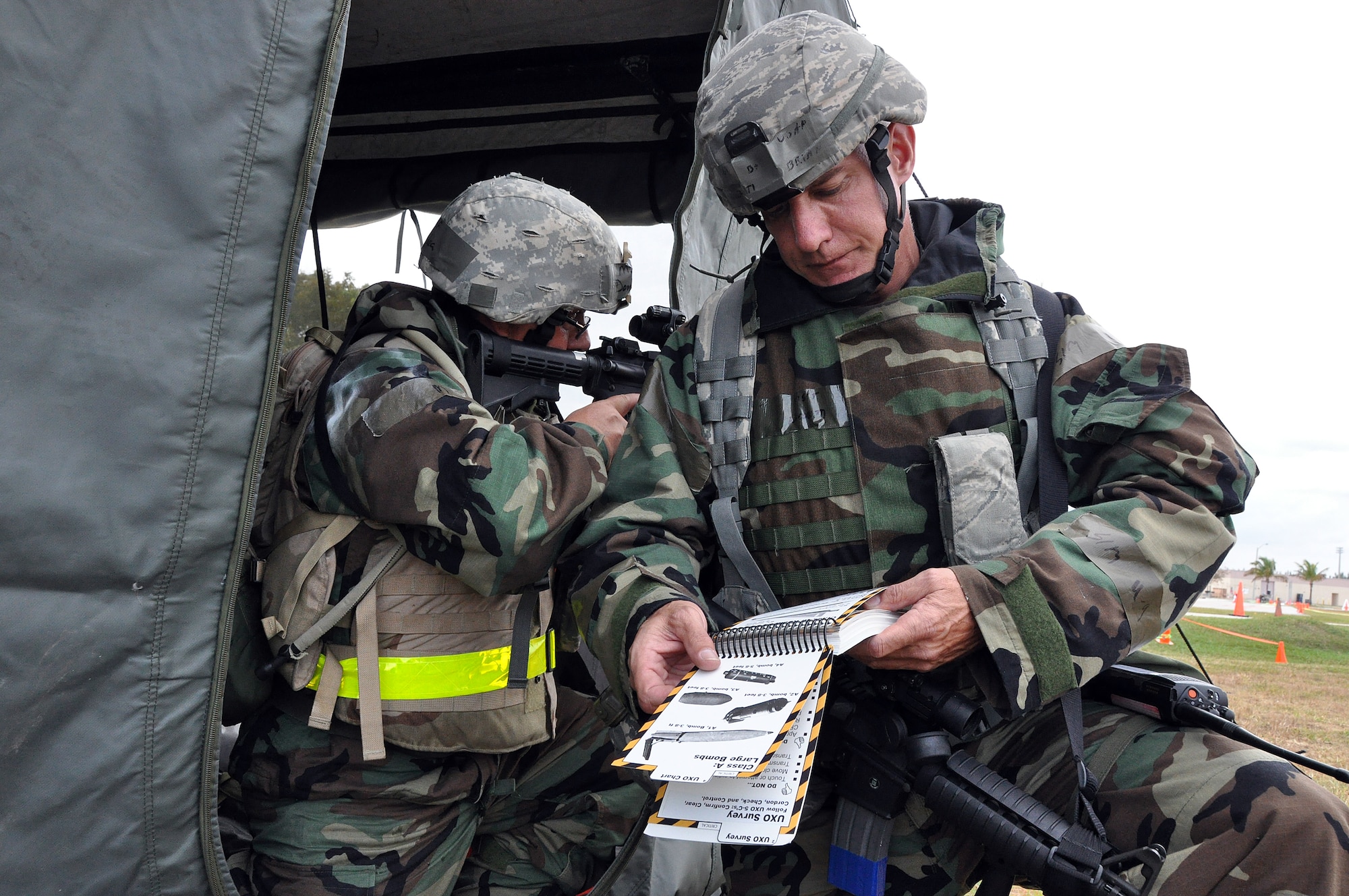 Two members of the 482nd Civil Engineer Squadron participate in the Operational Readiness Exercise at Homestead Air Reserve Base on Jan. 29. The ORE is to prepare the wing for an upcoming Operational Readiness Inspection scheduled later in the year. ORIs evaluate and measure the ability of units to perform their wartime, contingency, or force sustainment missions. (U.S. Air Force photo/Staff Sgt. Lou Burton)
