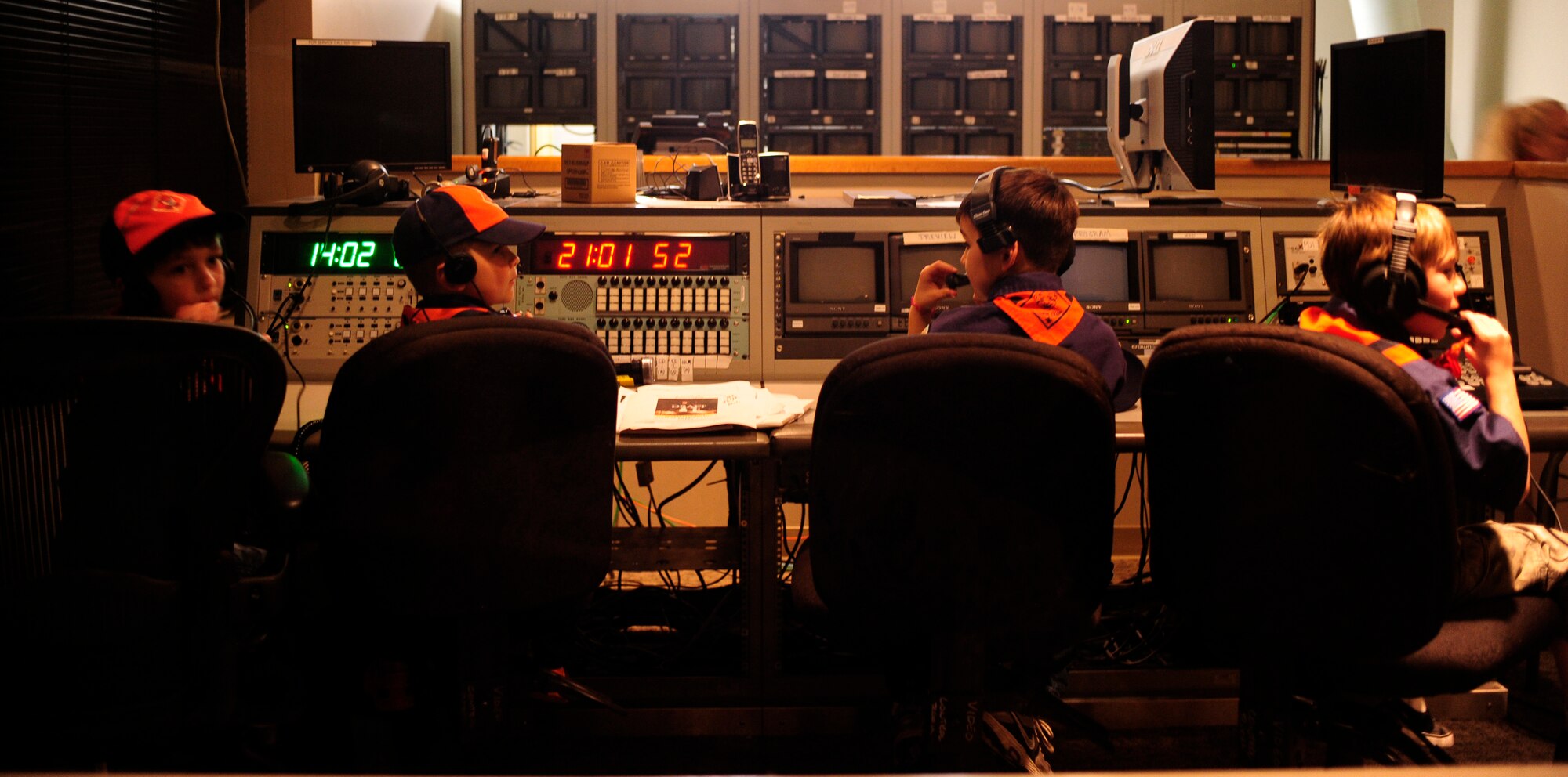 VANDENBERG AIR FORCE BASE, Calif. -- Vandenberg Cub Scout Pack 102 learns about live broadcasts in the television control room during their visit to the 30th Space Wing Public Affairs Office here Wednesday, Feb. 1, 2012. The PA staff helped the scouts earn their news and media merit badge. (U.S. Air Force photo/Staff Sgt. Andrew Satran) ) 